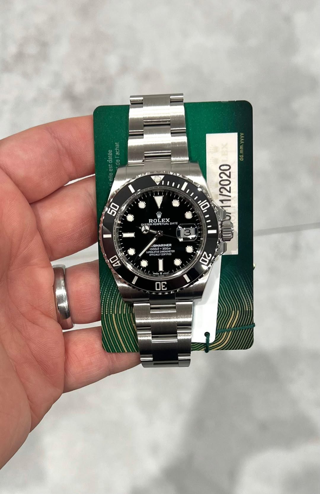 May be an image of wrist watch and text