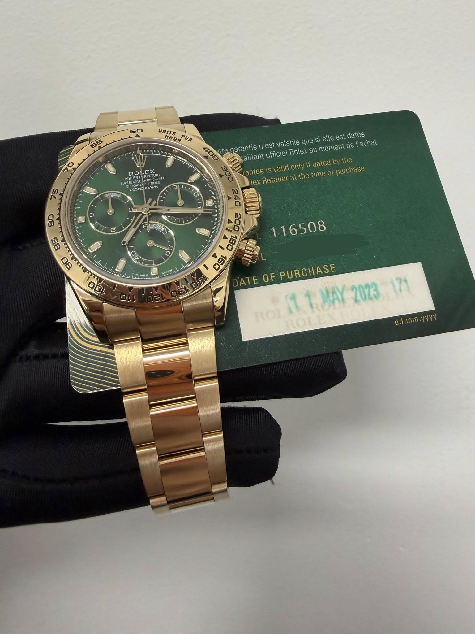 May be an image of wrist watch and text that says '50 65 URITS อบ Hoυ PER 70 X 400 datée Tachat garantie n'est valable ques aillant officiel Rolex umoment anteisvatdntya.plinches…