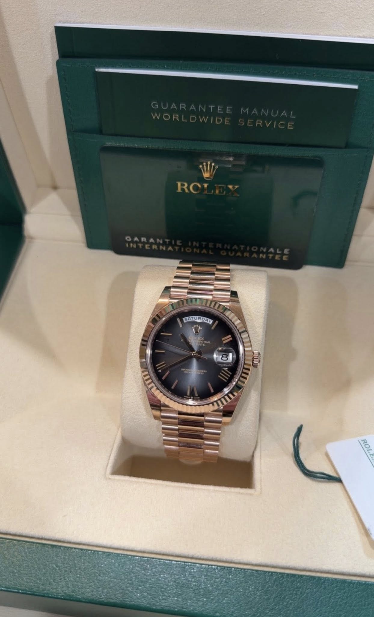 May be an image of wrist watch and text
