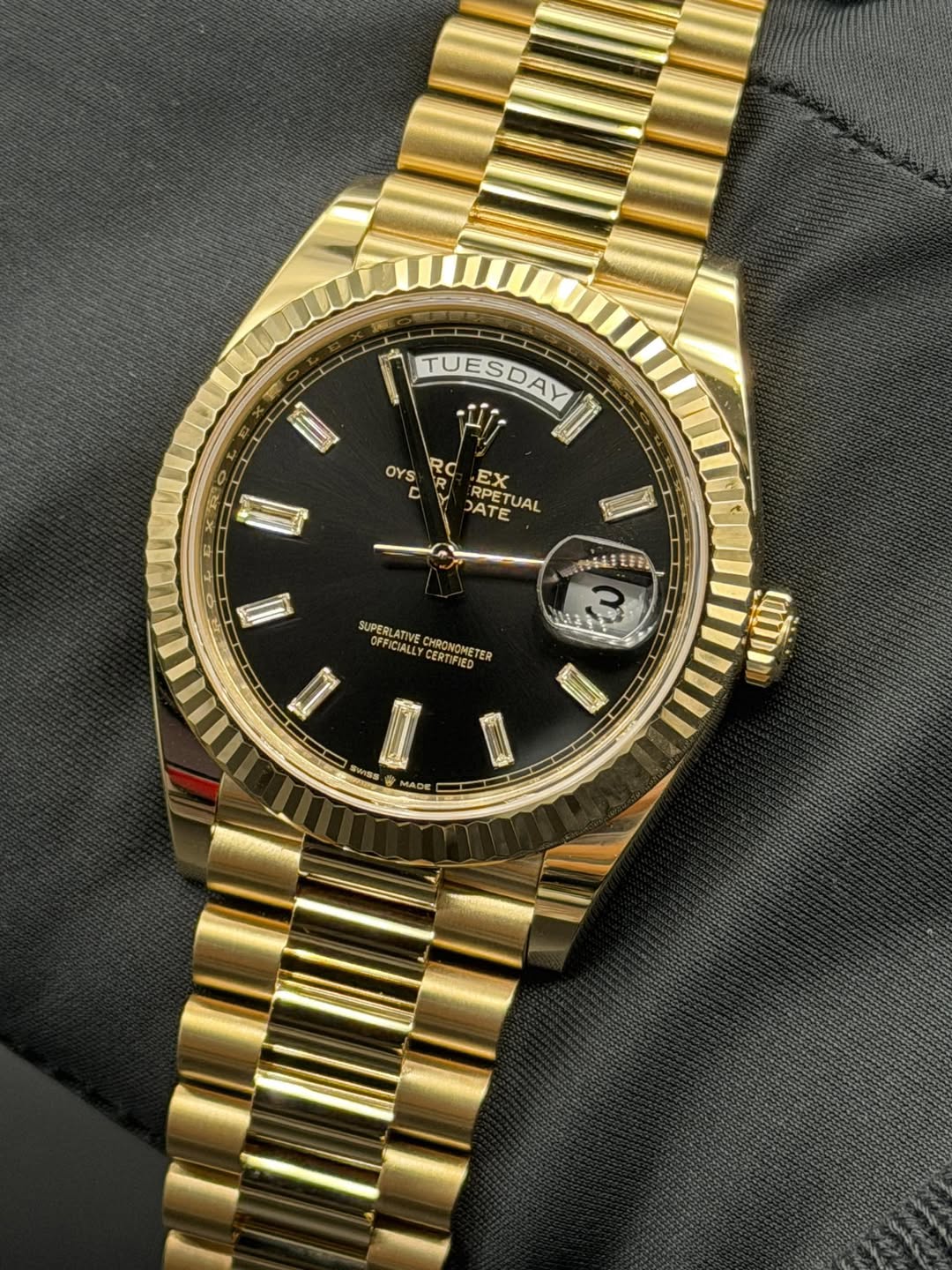 May be an image of wrist watch and text