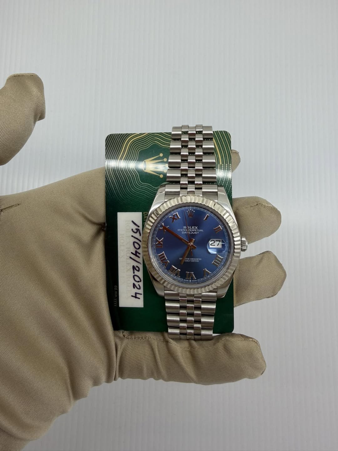May be an image of wrist watch and text