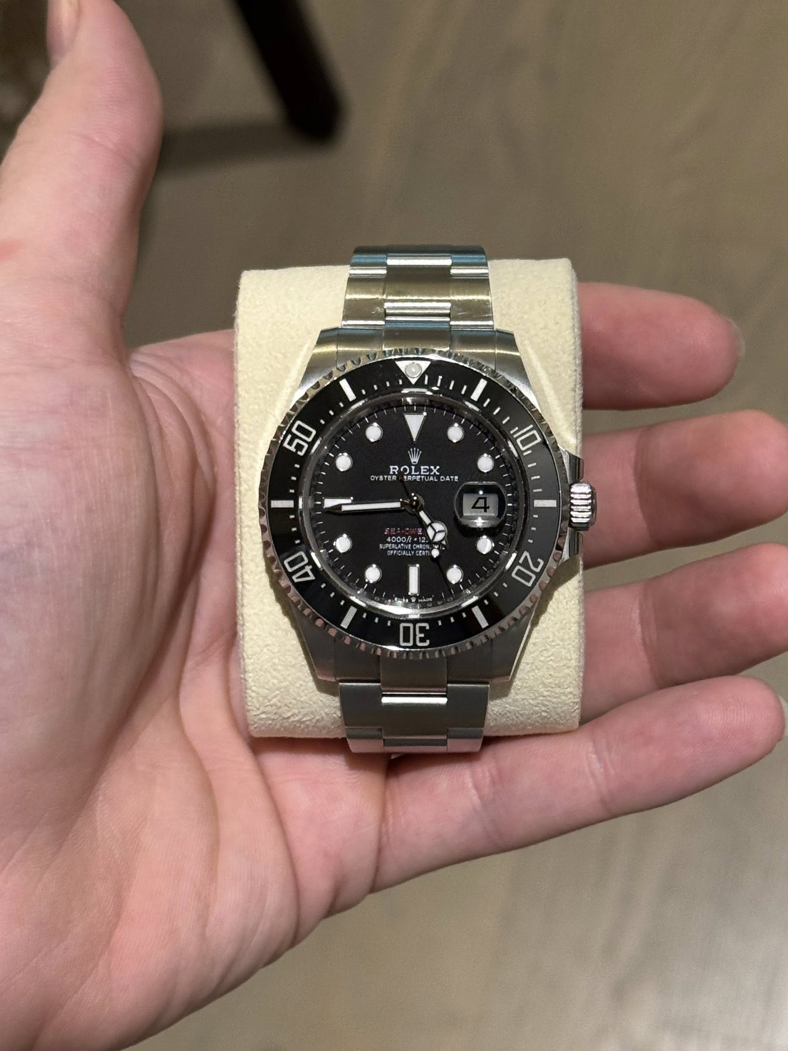 May be an image of wrist watch and text