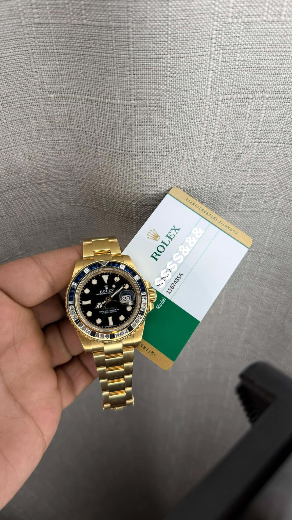 May be an image of wrist watch and text