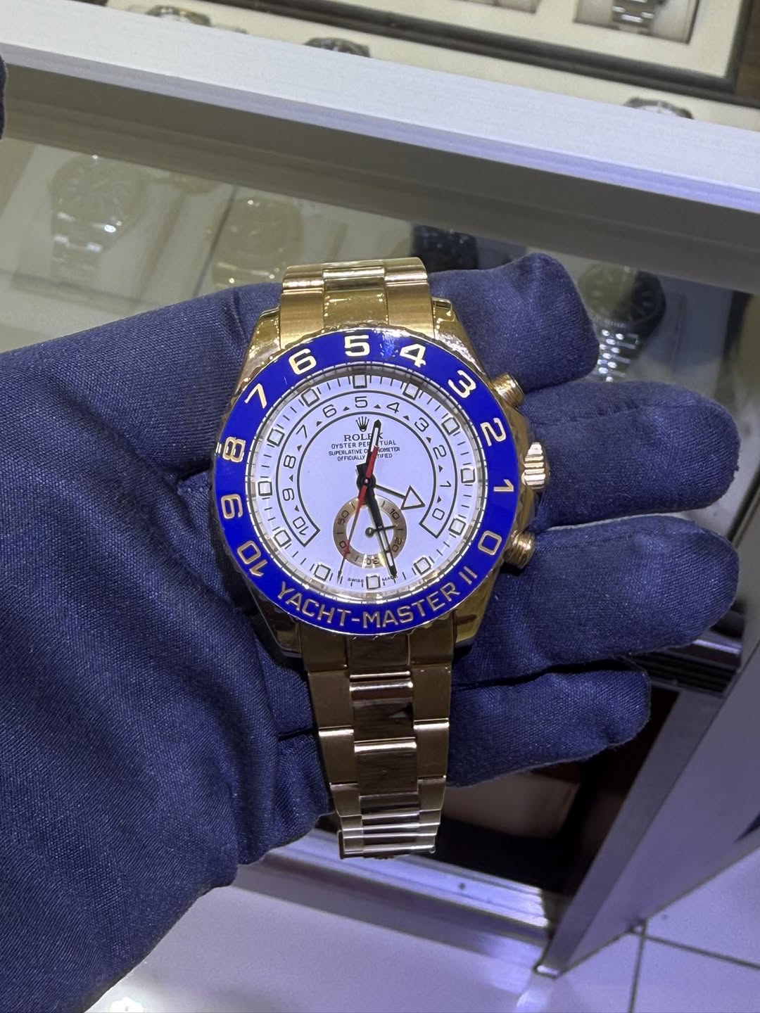 May be an image of wrist watch and text