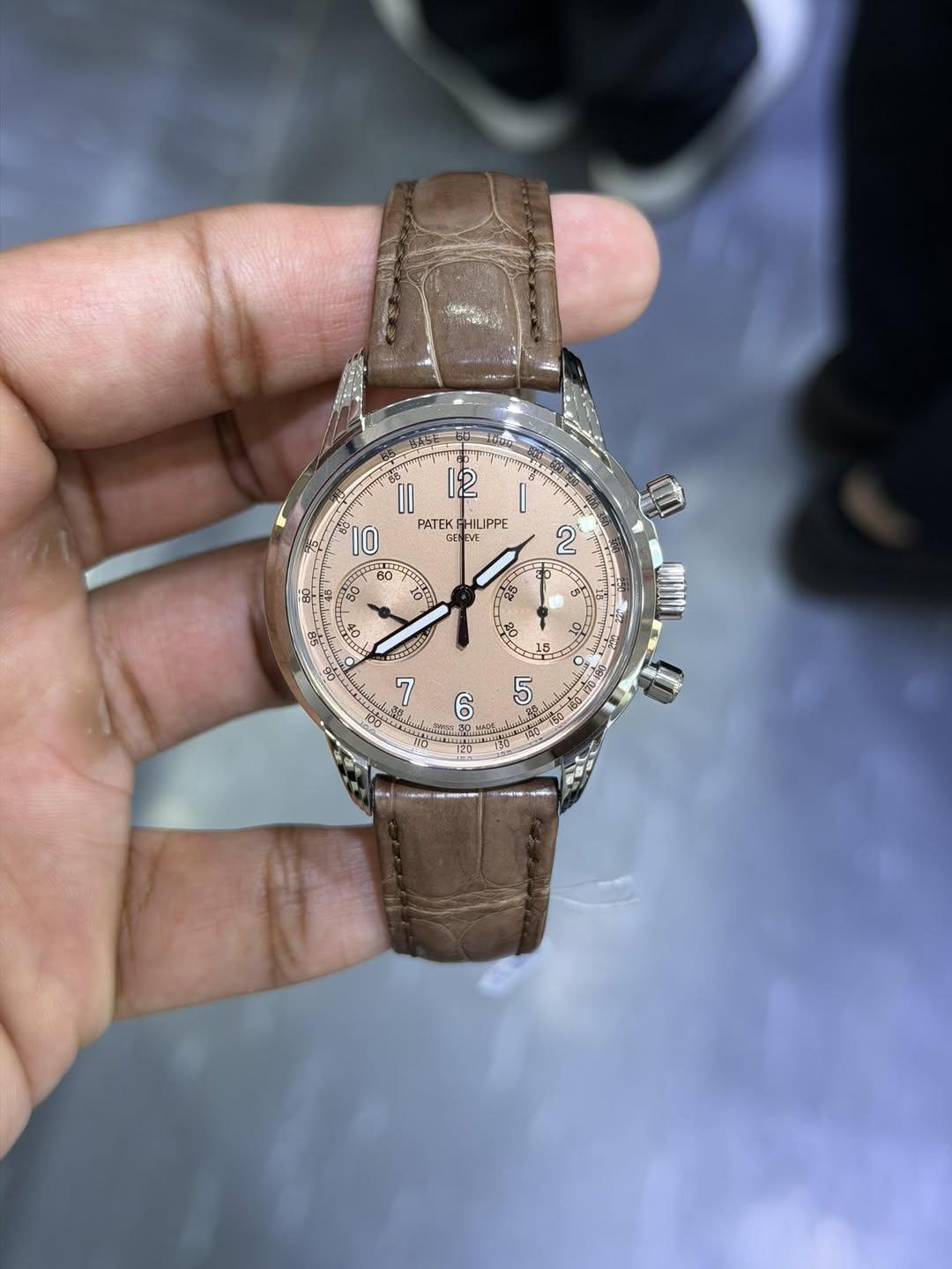 May be an image of wrist watch and text