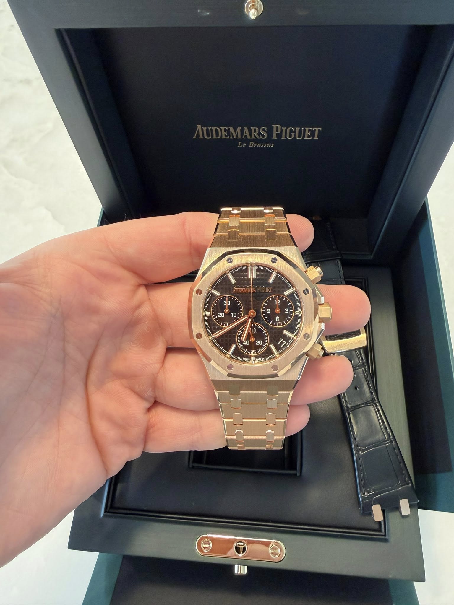 May be an image of wrist watch and text