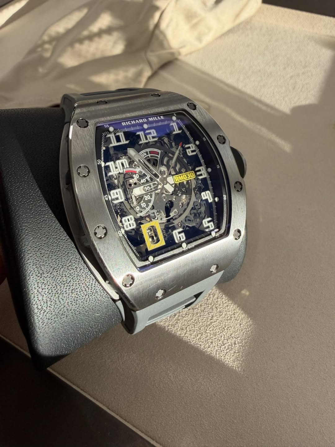 May be an image of wrist watch and text
