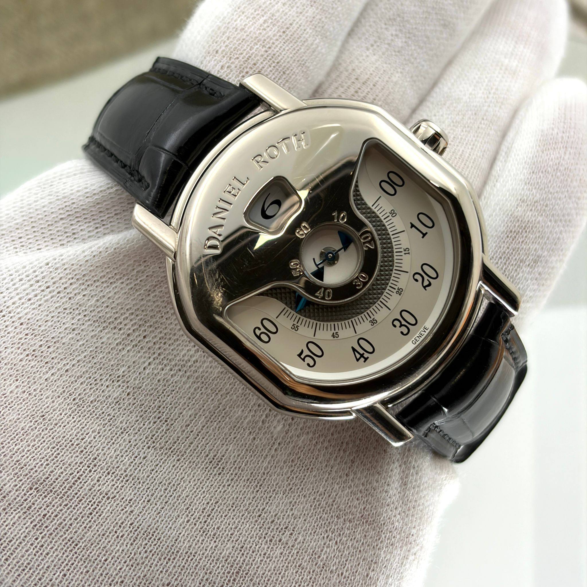 May be an image of wrist watch and text