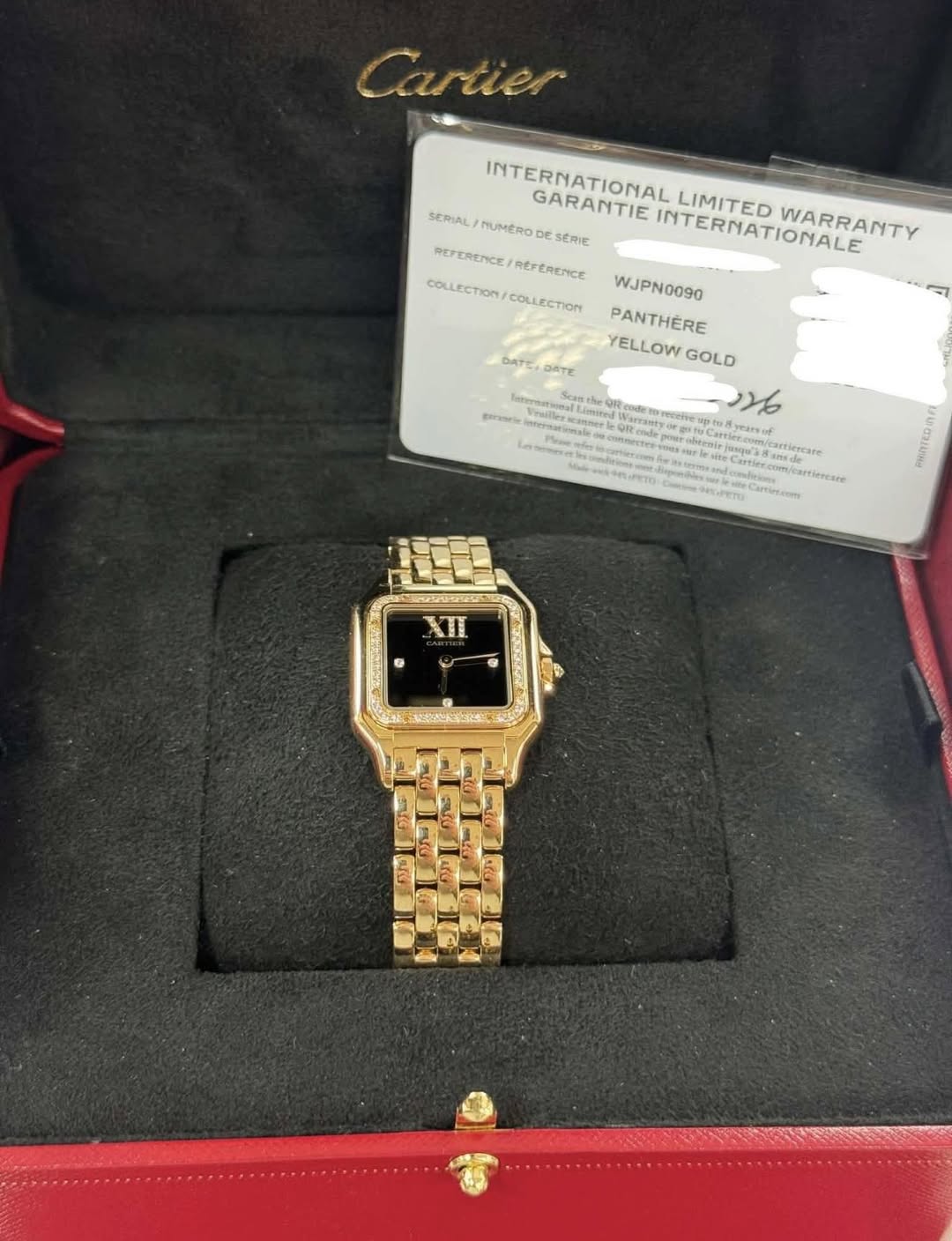 May be an image of wrist watch and text