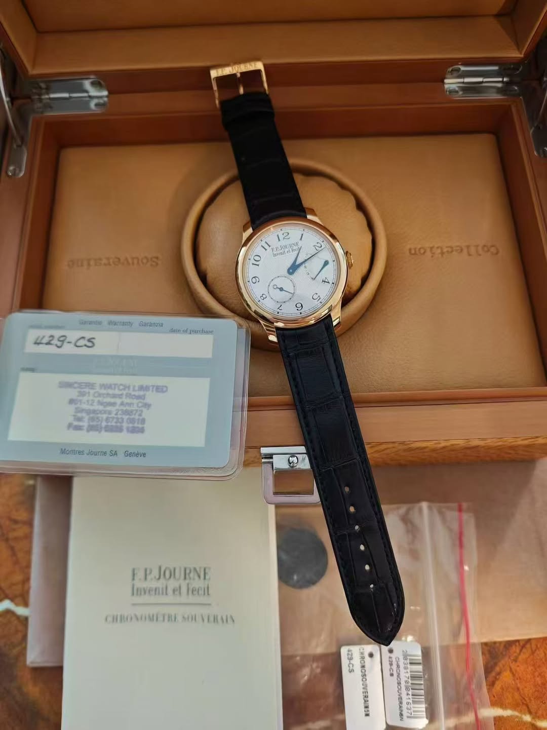 May be an image of wrist watch and text