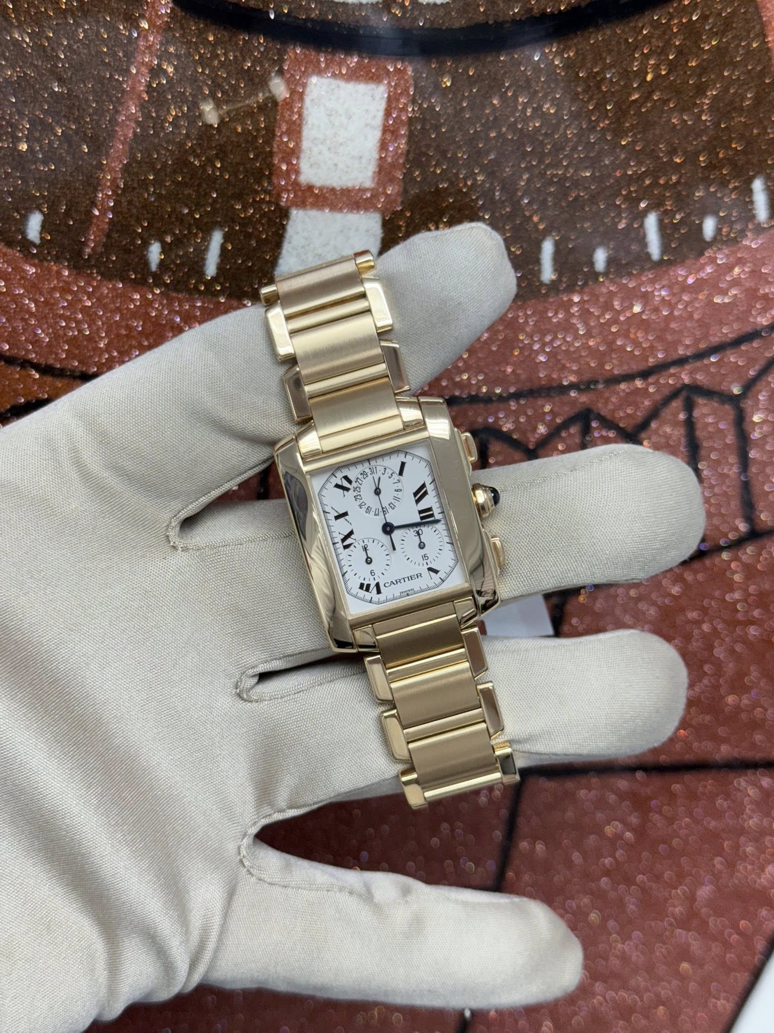 May be an image of wrist watch and text
