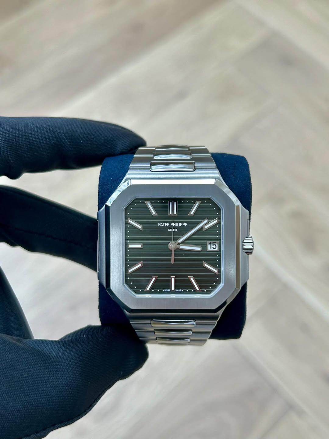 May be an image of wrist watch and text