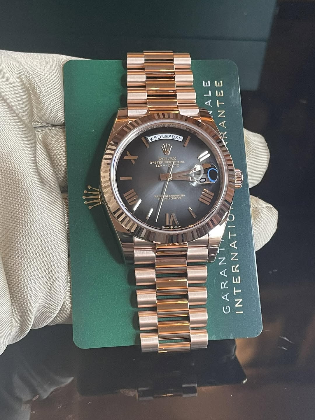 May be an image of wrist watch and text