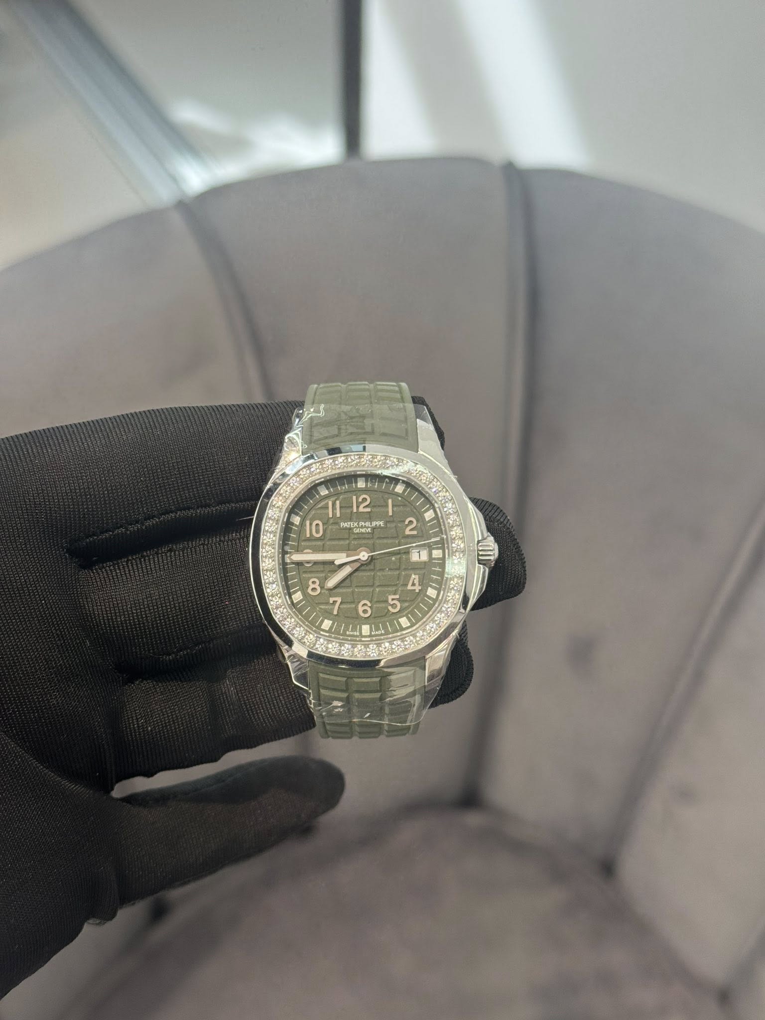 May be an image of wrist watch and text