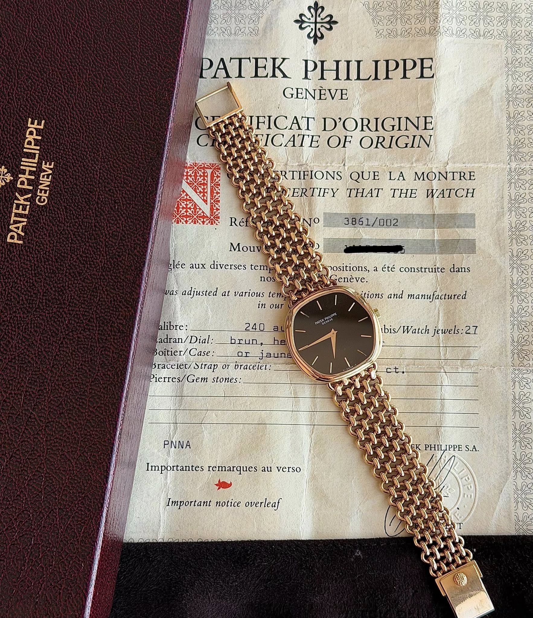 May be an image of wrist watch and text that says ' PATEK PHILIPPE GENÈVE IFICAT D'ORIGINE FICATE OF ORIGIN PATEKPHILIPPE PATE PHILIPPE GENEVE SRTIFIONS QUE LA MONTRE CERTIFY THAT…