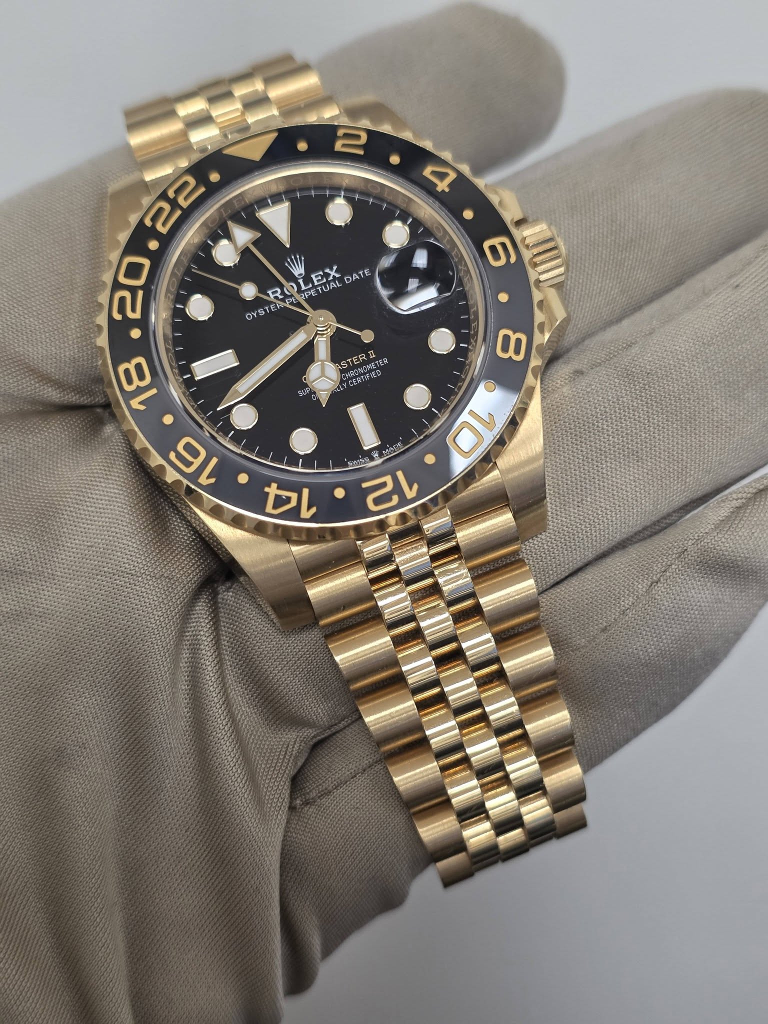 May be an image of wrist watch and text