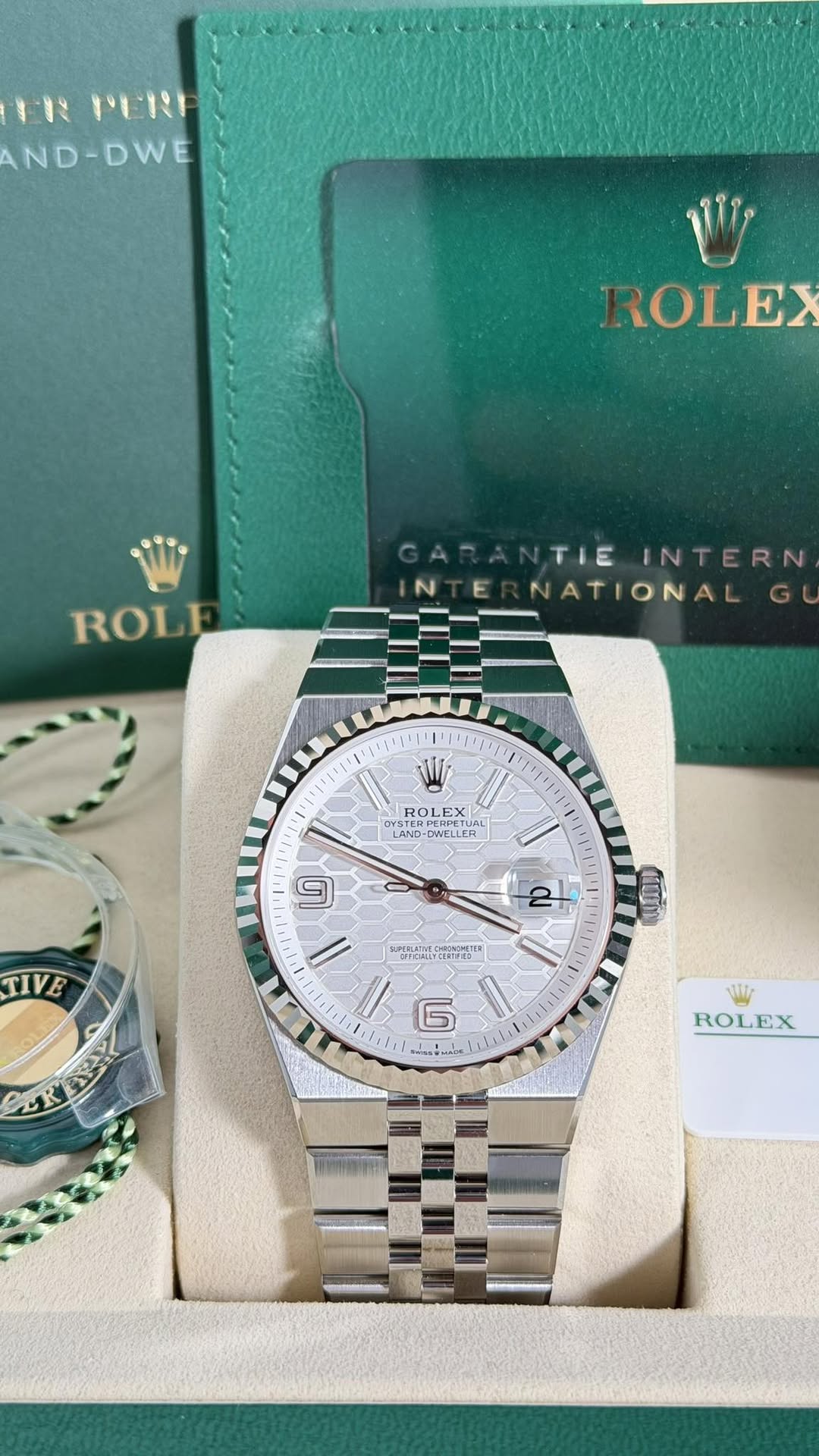 May be an image of wrist watch and text