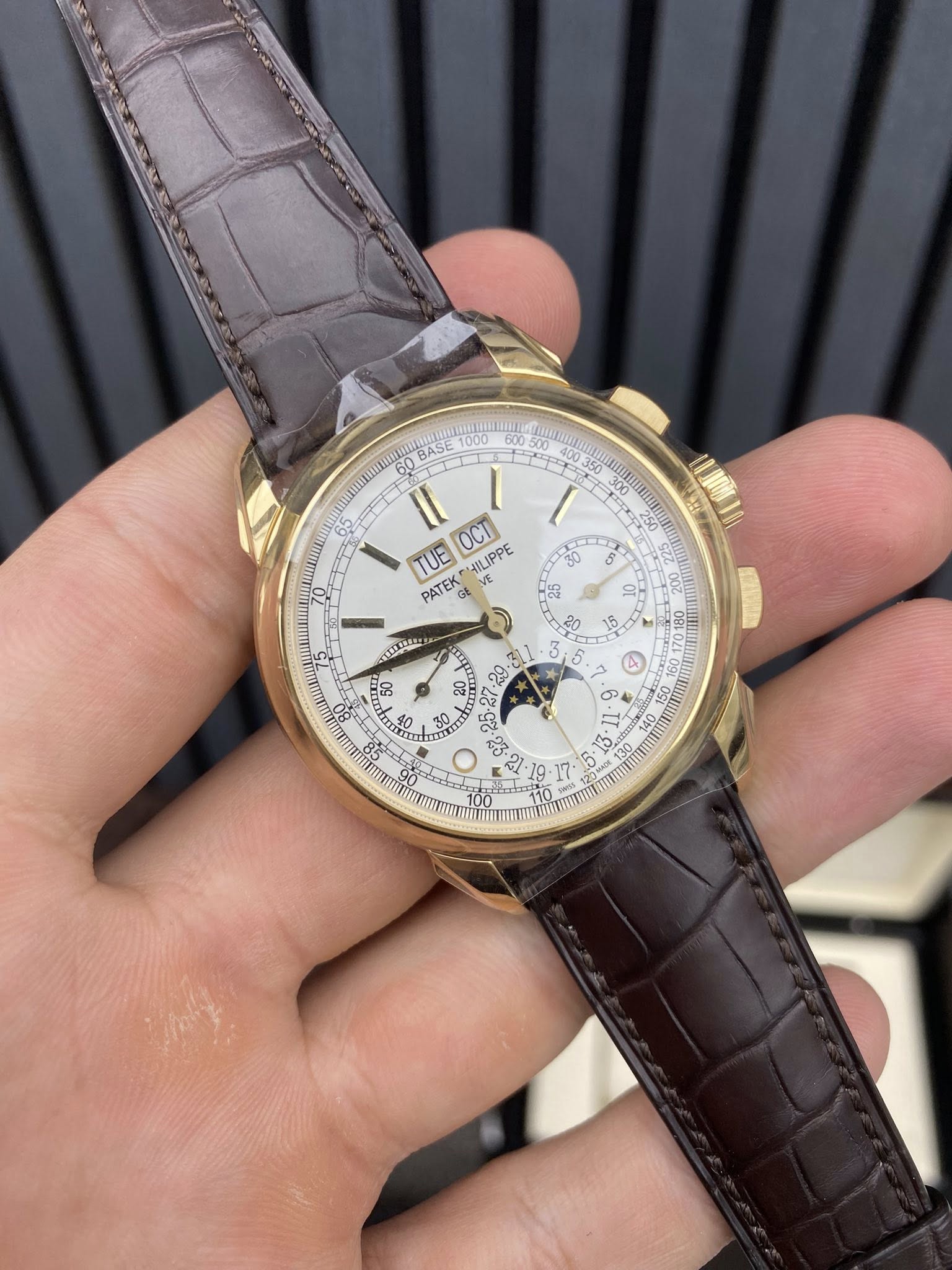 May be an image of wrist watch and text