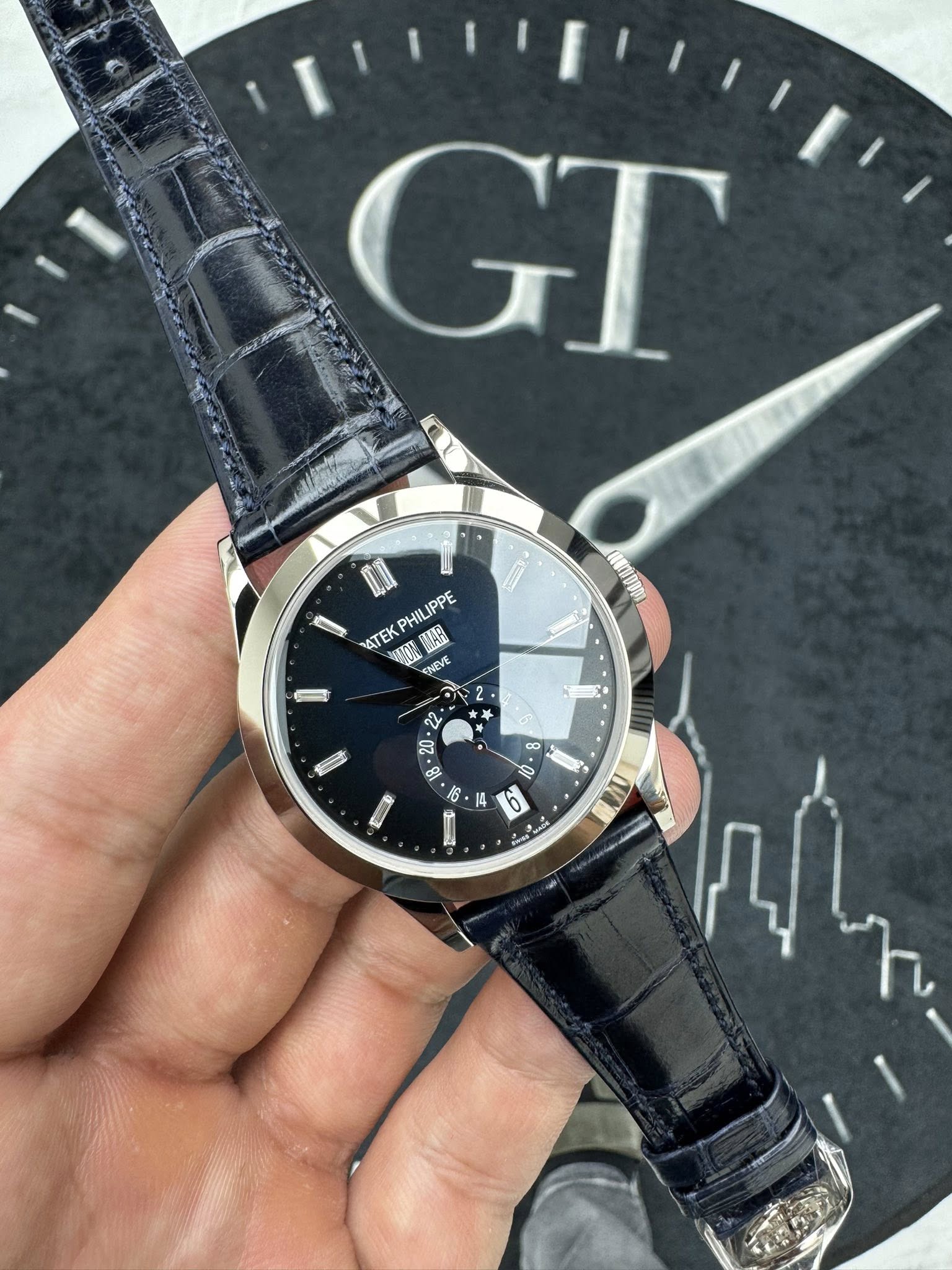 May be an image of wrist watch and text