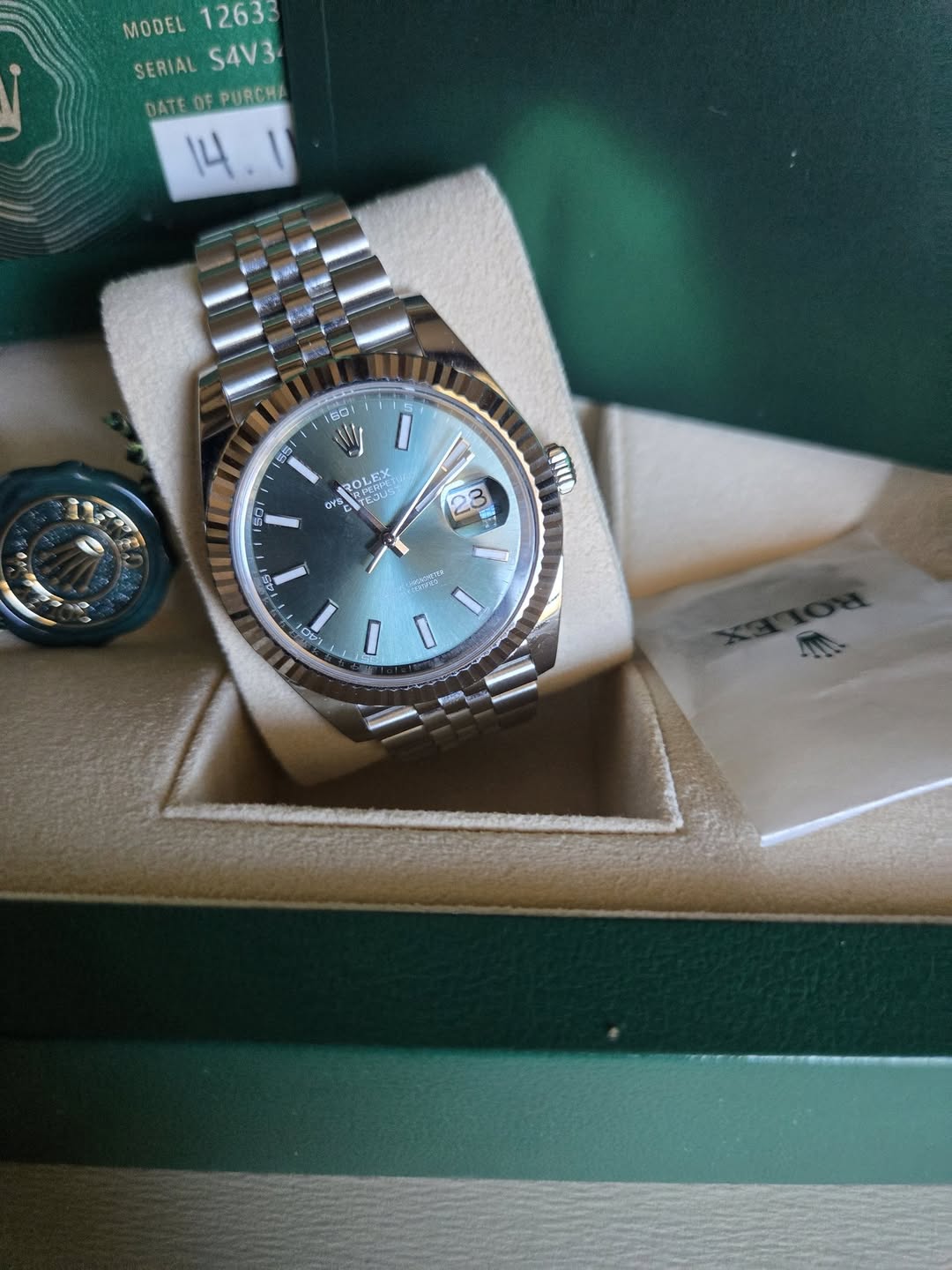 May be an image of wrist watch and text