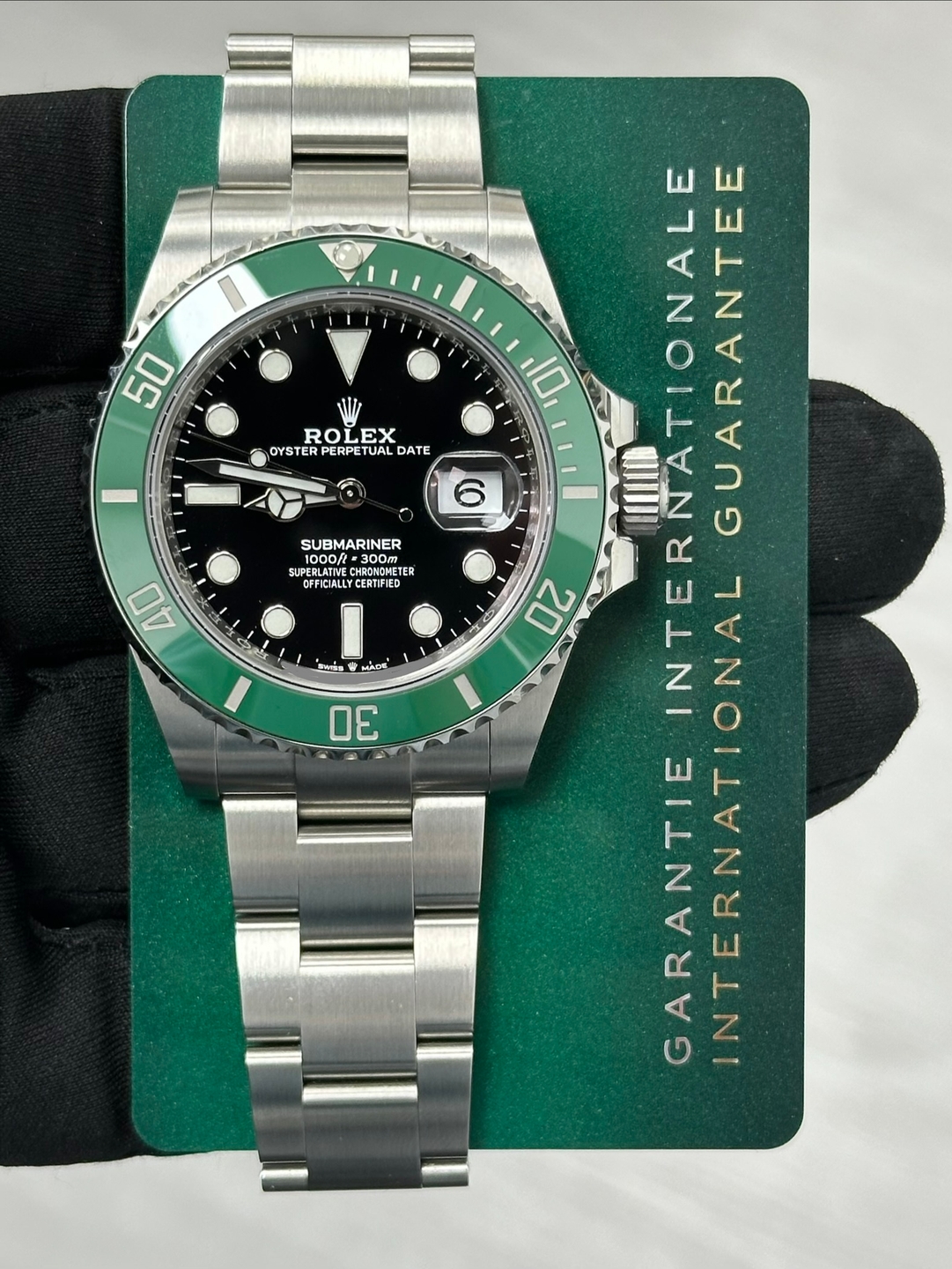 May be an image of wrist watch and text that says '50 ROLEX RO EX OYSTER PERPETUA TUAL DATE SUBMARINER CUSCRATO CHRONCMETER ER CFFICIALLYCERTIFIED LYCERTIFIED 40 Berig MADE 30…