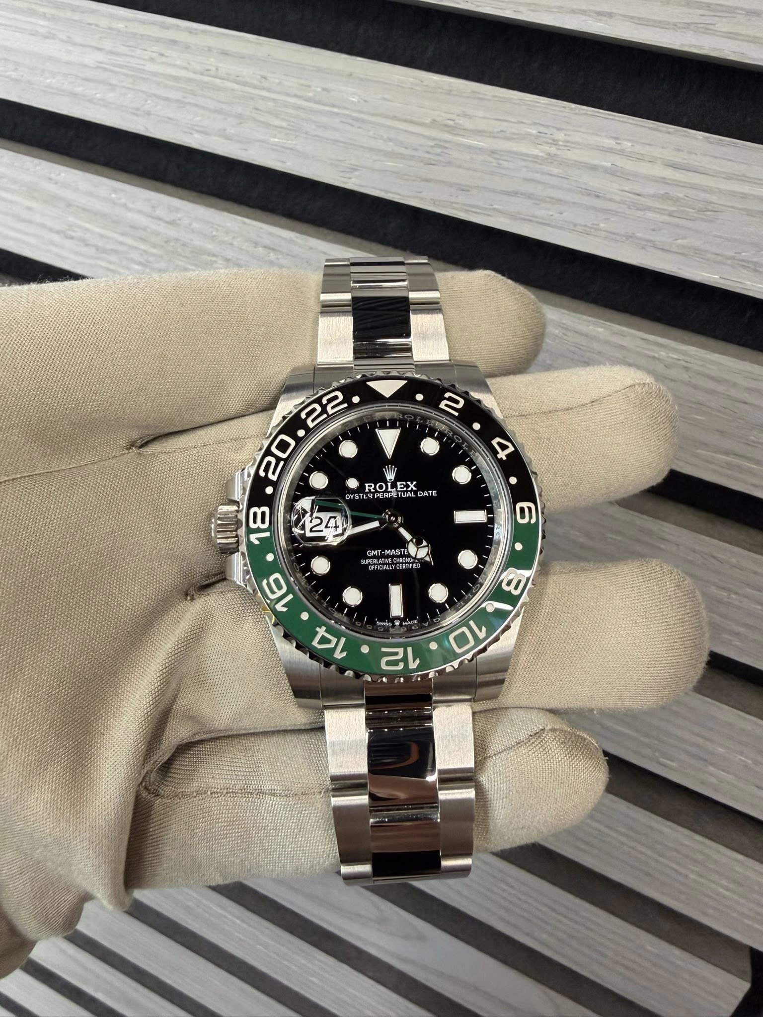 May be an image of wrist watch and text