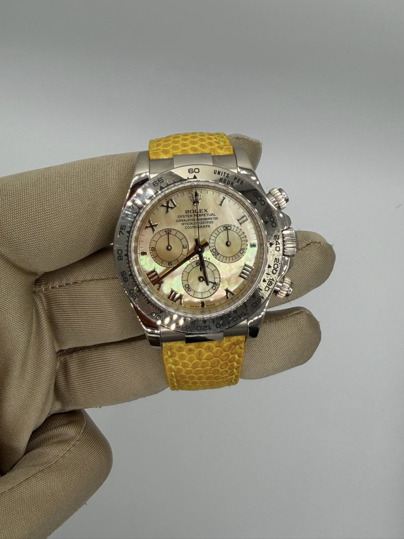 May be an image of wrist watch and text
