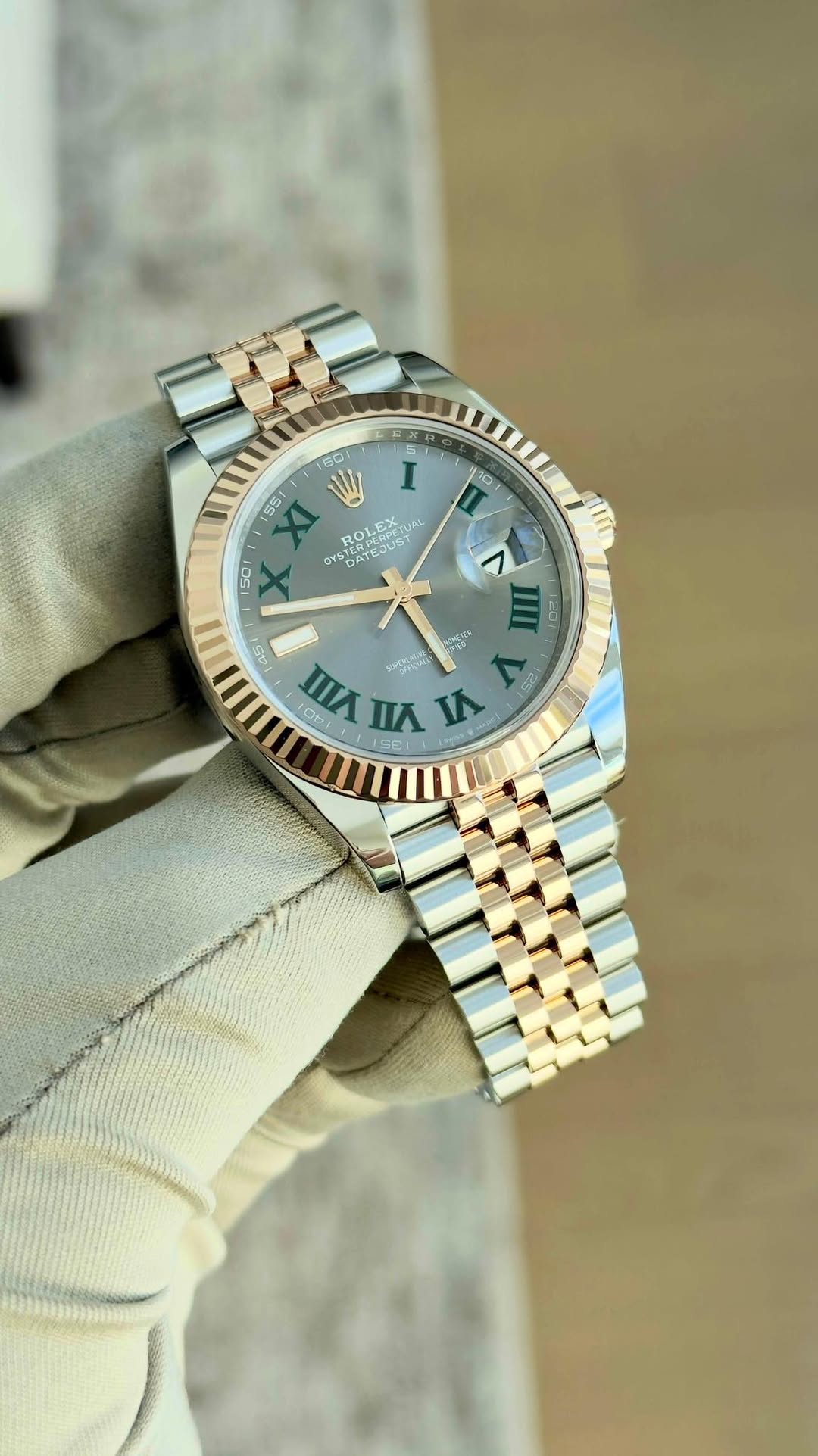 May be an image of wrist watch and text