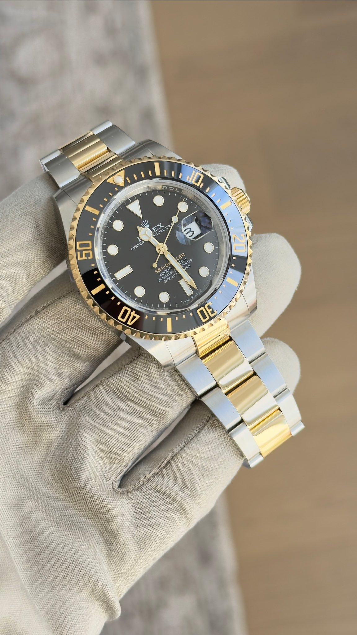 May be an image of wrist watch and text