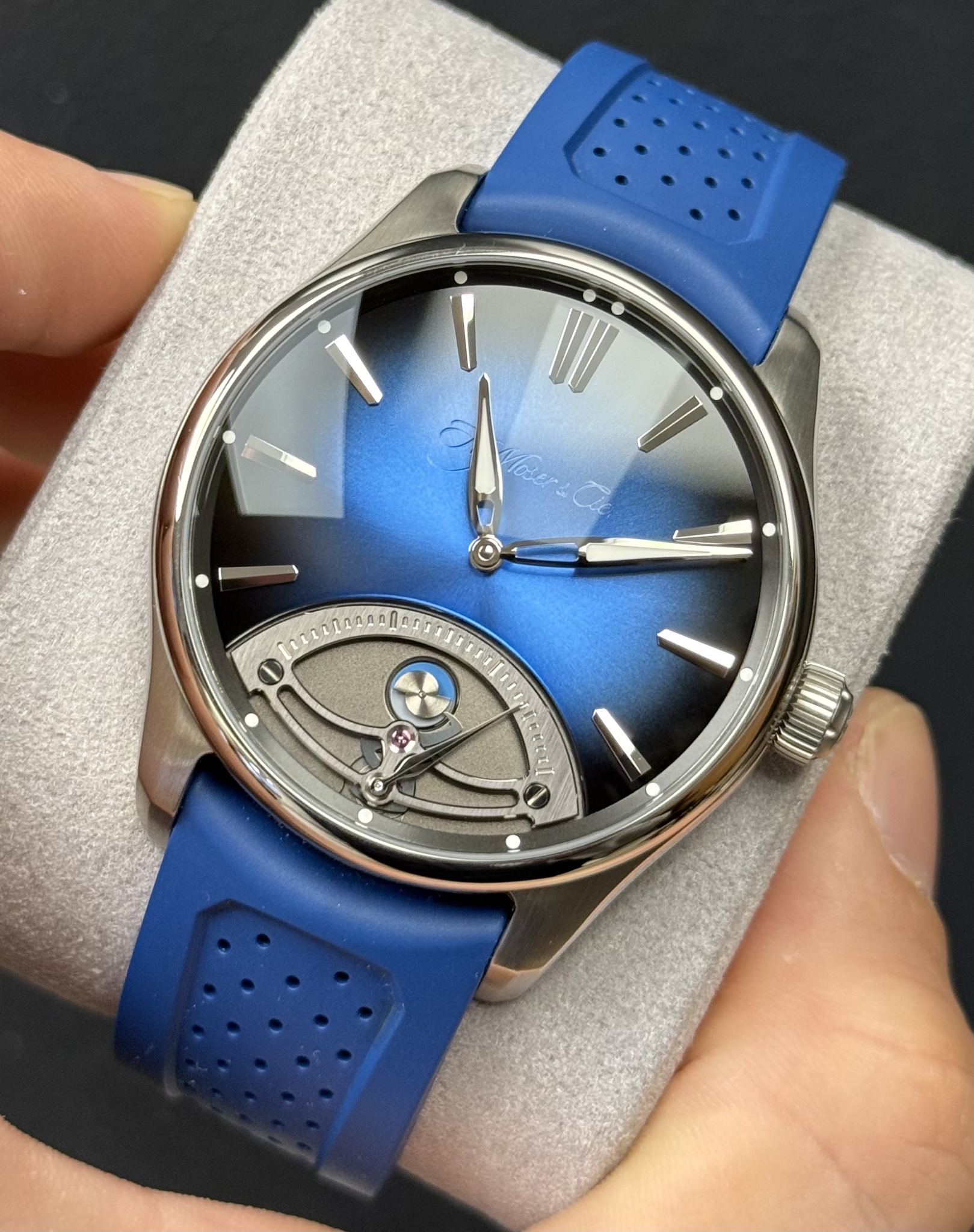 May be an image of wrist watch and text