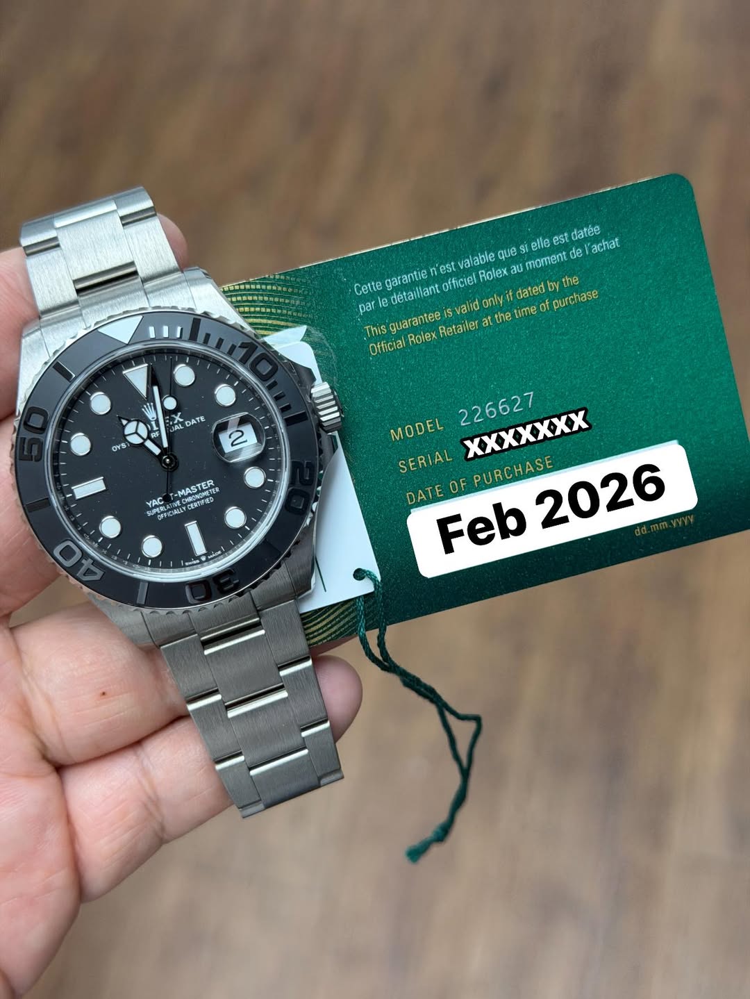 May be an image of wrist watch and text that says 'elie est datée achat Cette garantie détaillant officiel Rolex nest valabieo que moment de dated tythe the par Thisguarantee…