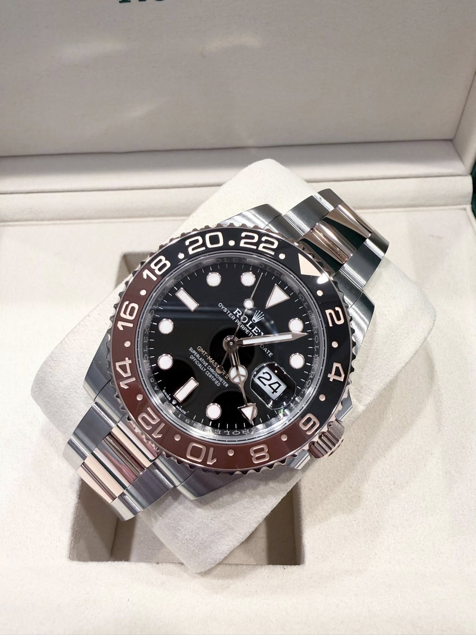 May be an image of wrist watch and text
