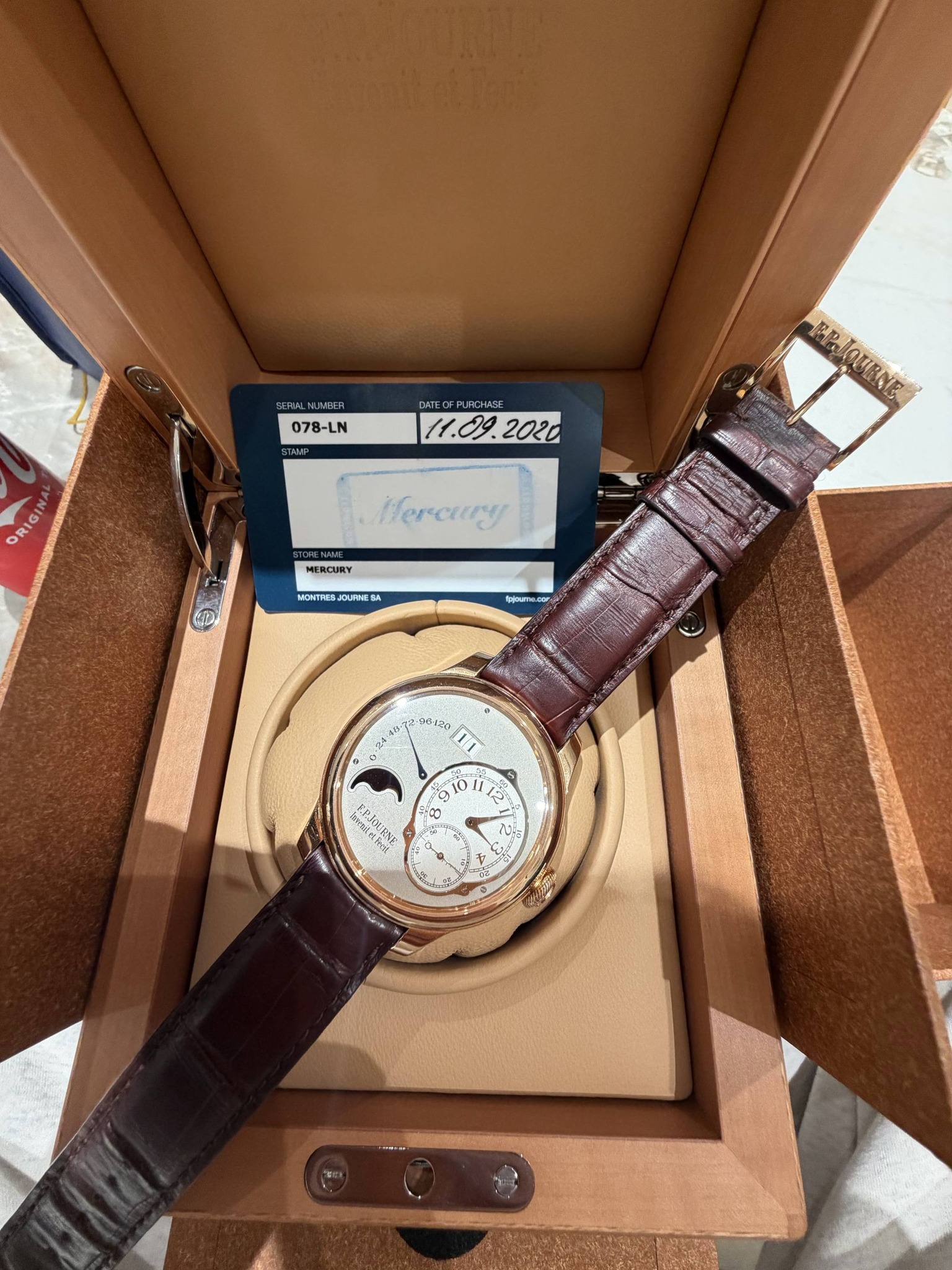 May be an image of wrist watch and text