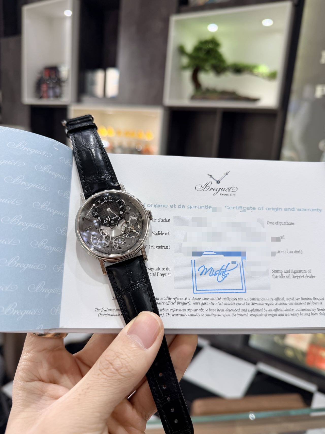 May be an image of wrist watch and text