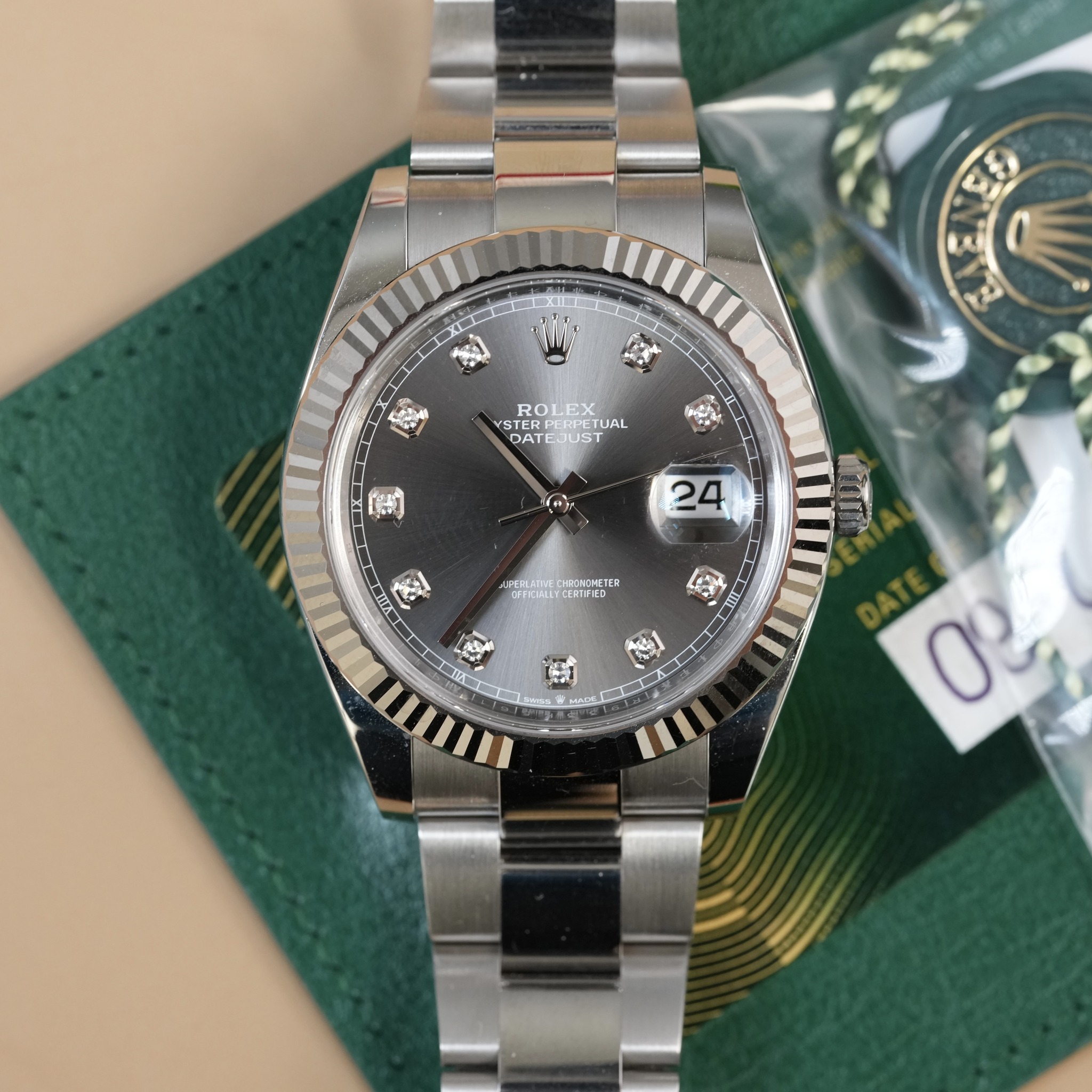 May be an image of wrist watch and text