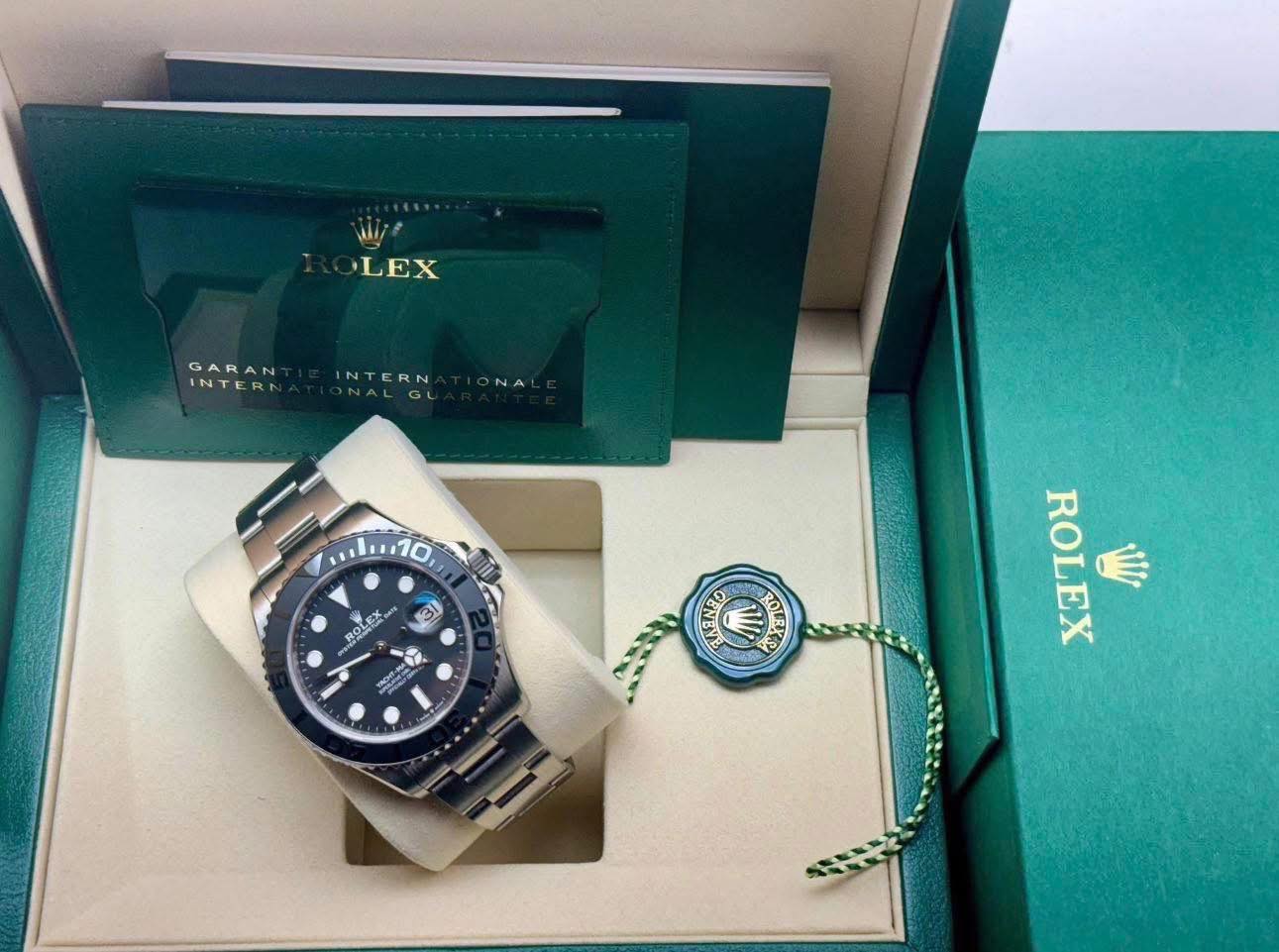 May be an image of wrist watch and text that says 'WIZ LEX GARAN INTERN INTERNA NALGL NAI ROLEX AM 31 O ROLEX WI'