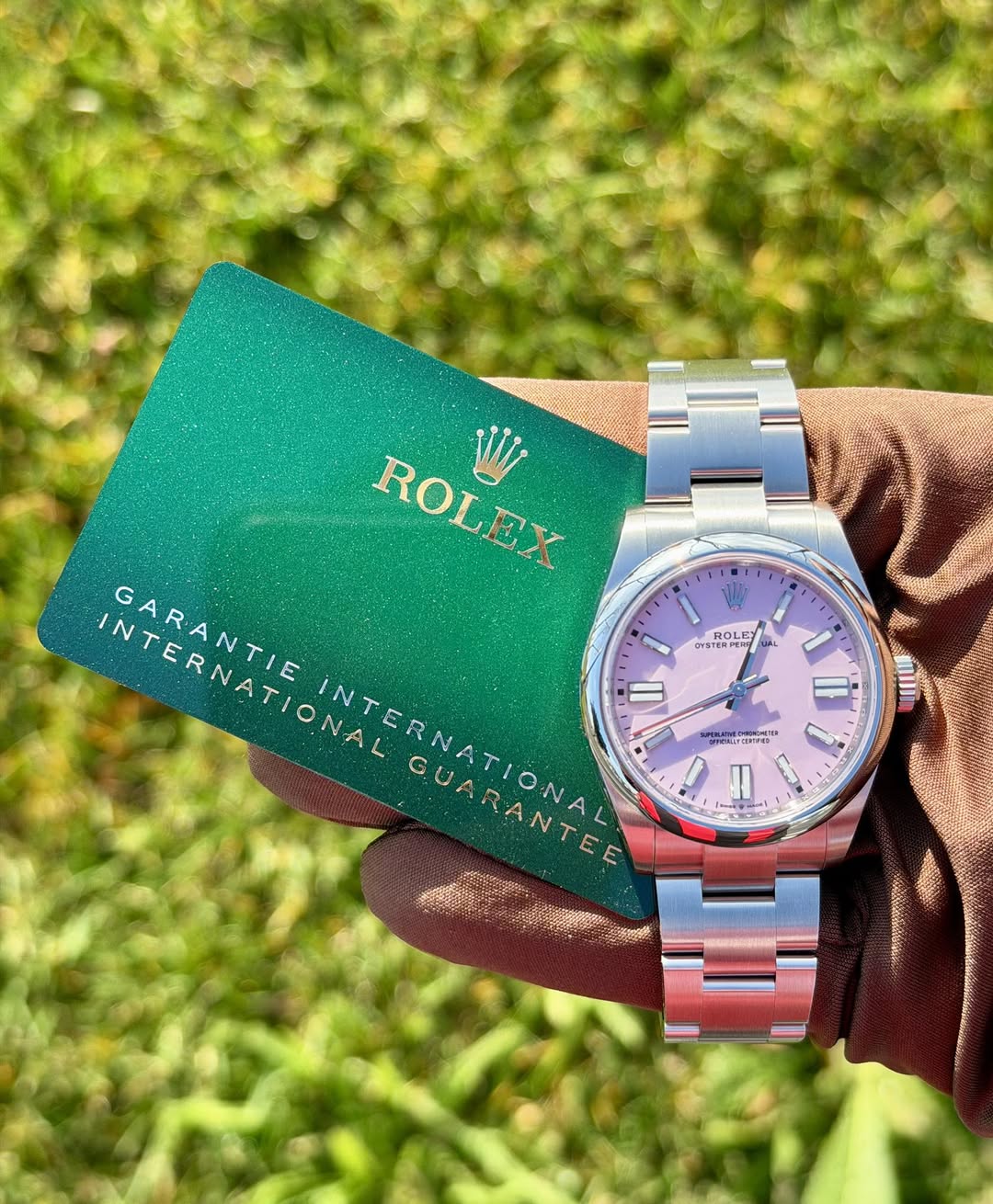 May be an image of wrist watch and text
