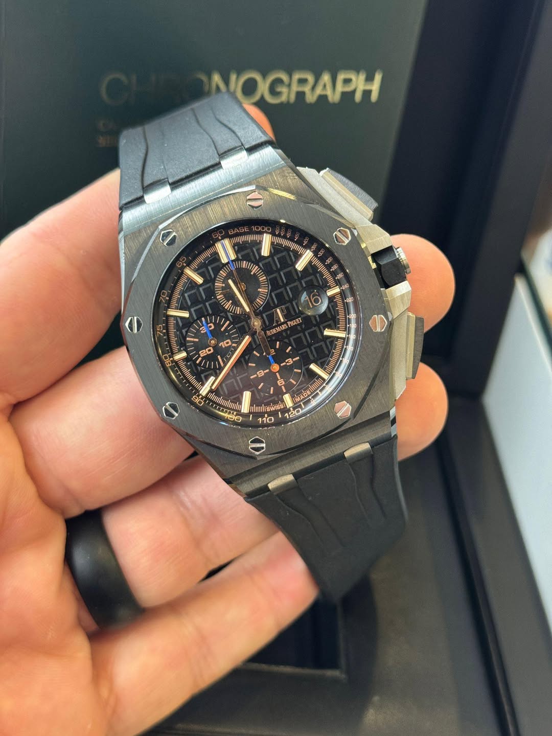 May be an image of wrist watch and text