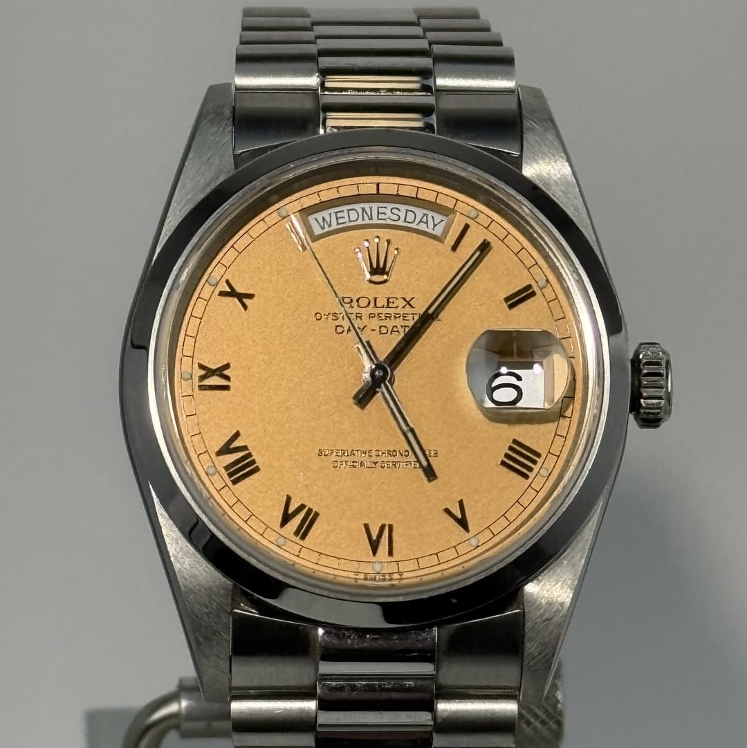 May be an image of wrist watch and text