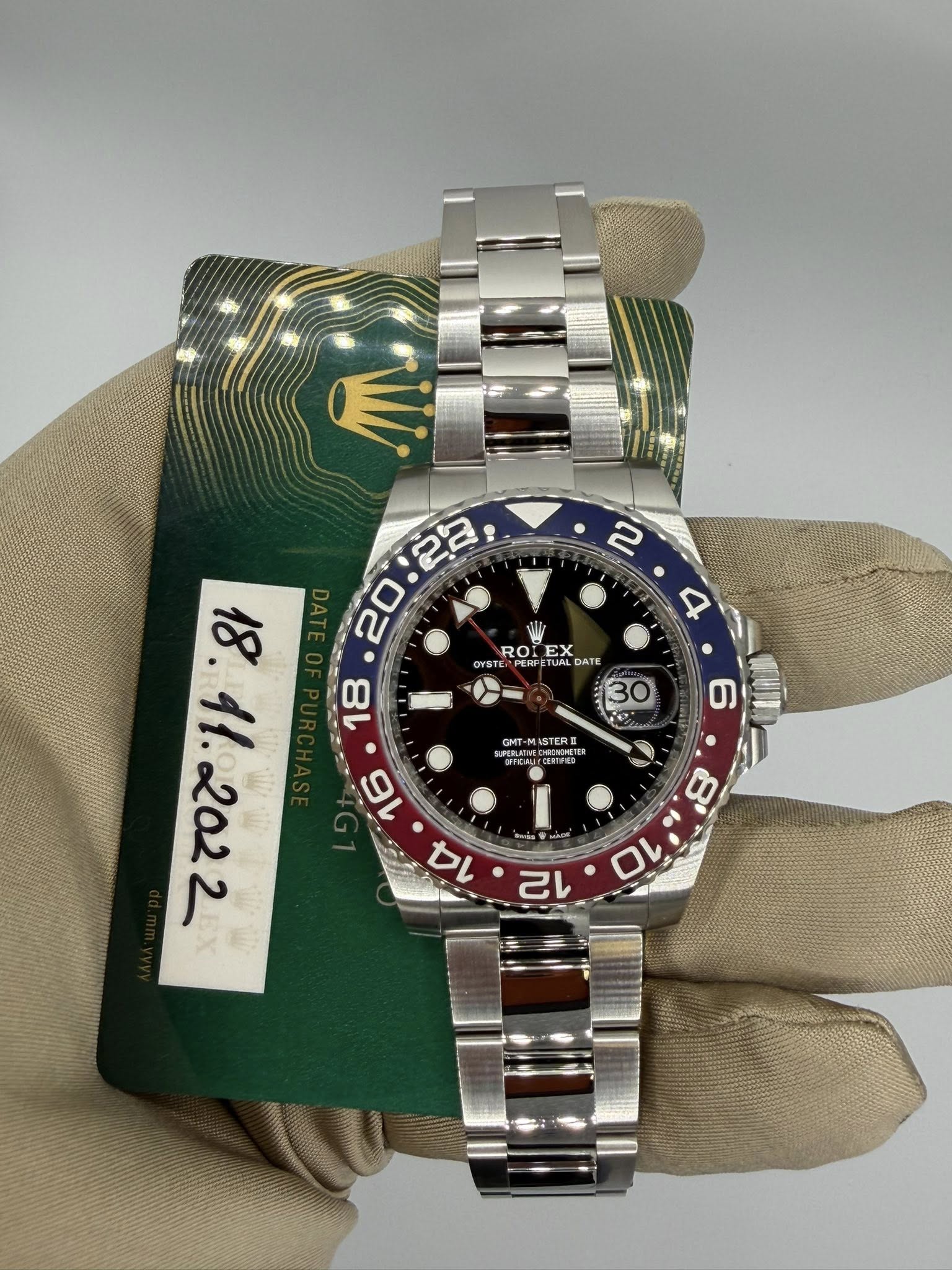 May be an image of wrist watch and text