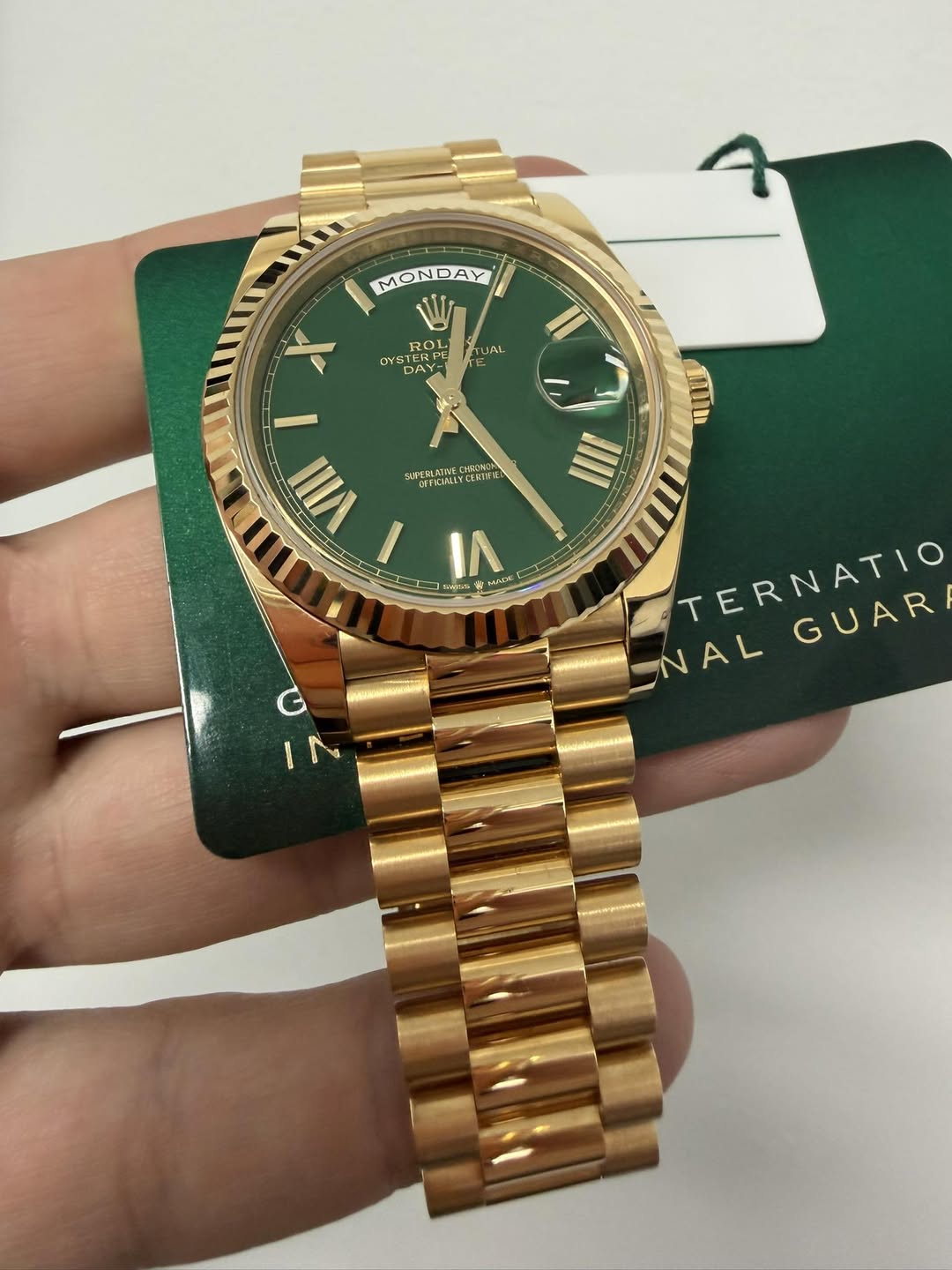 May be an image of wrist watch and text