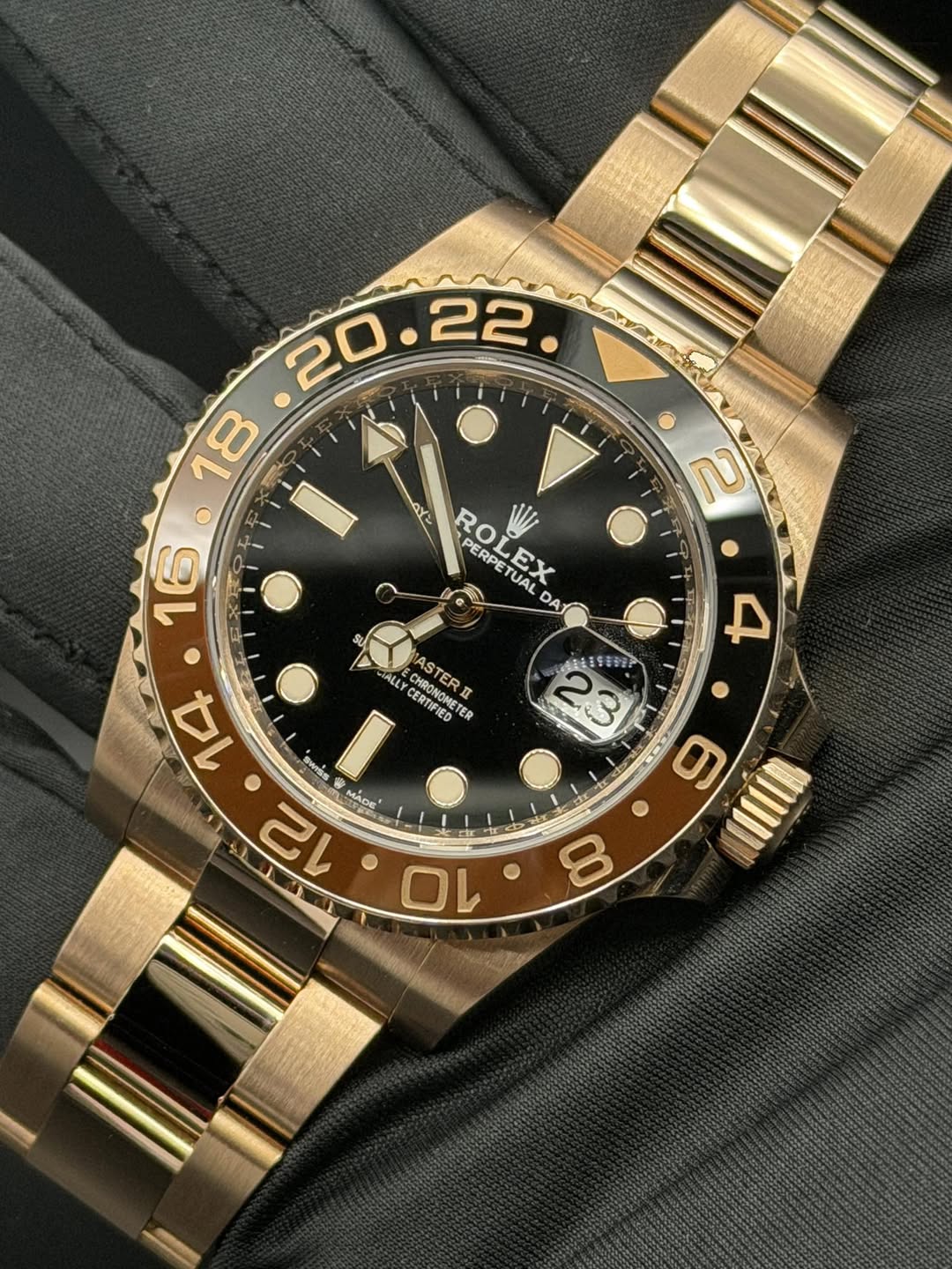May be an image of wrist watch and text