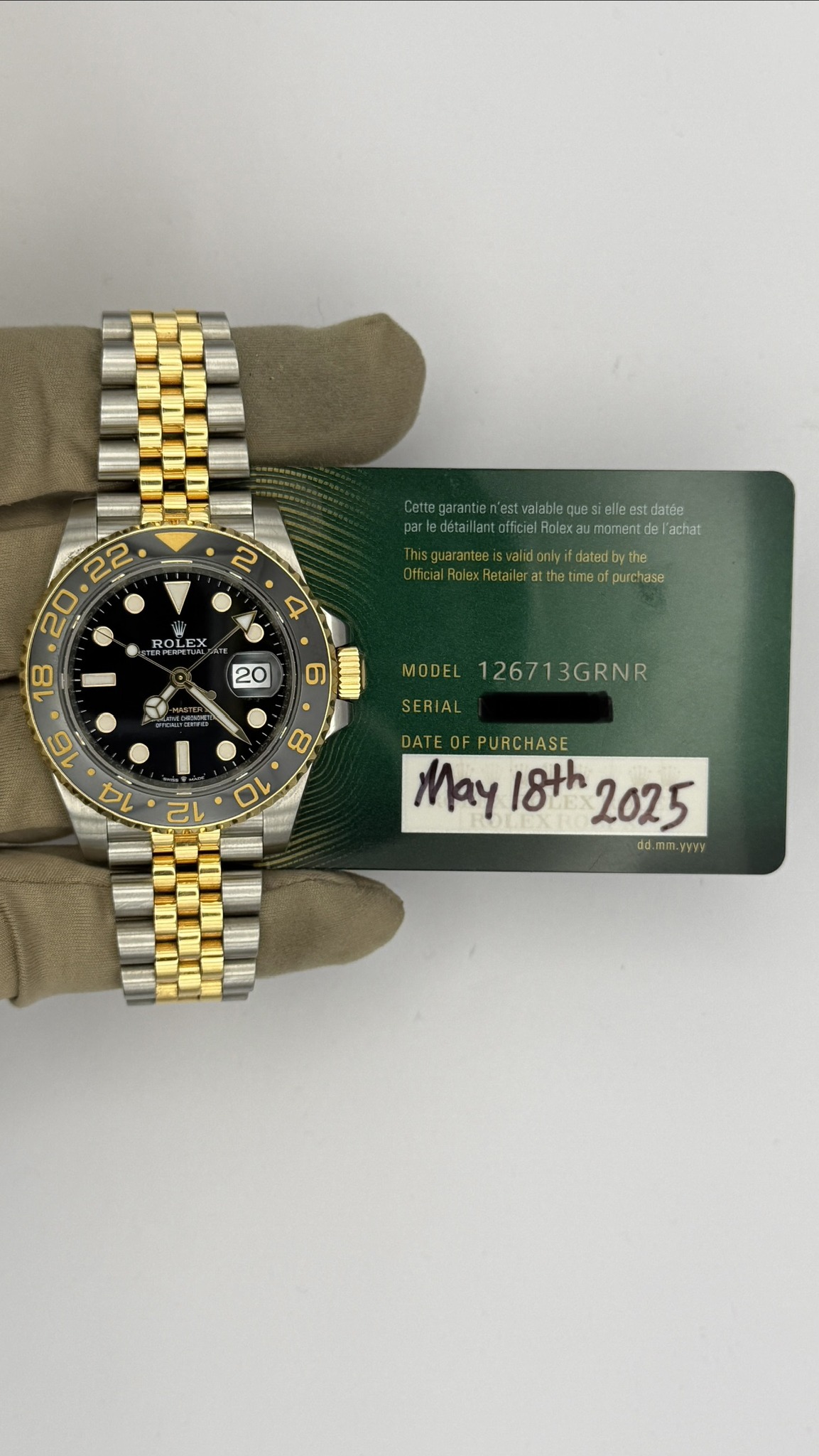 May be an image of wrist watch and text