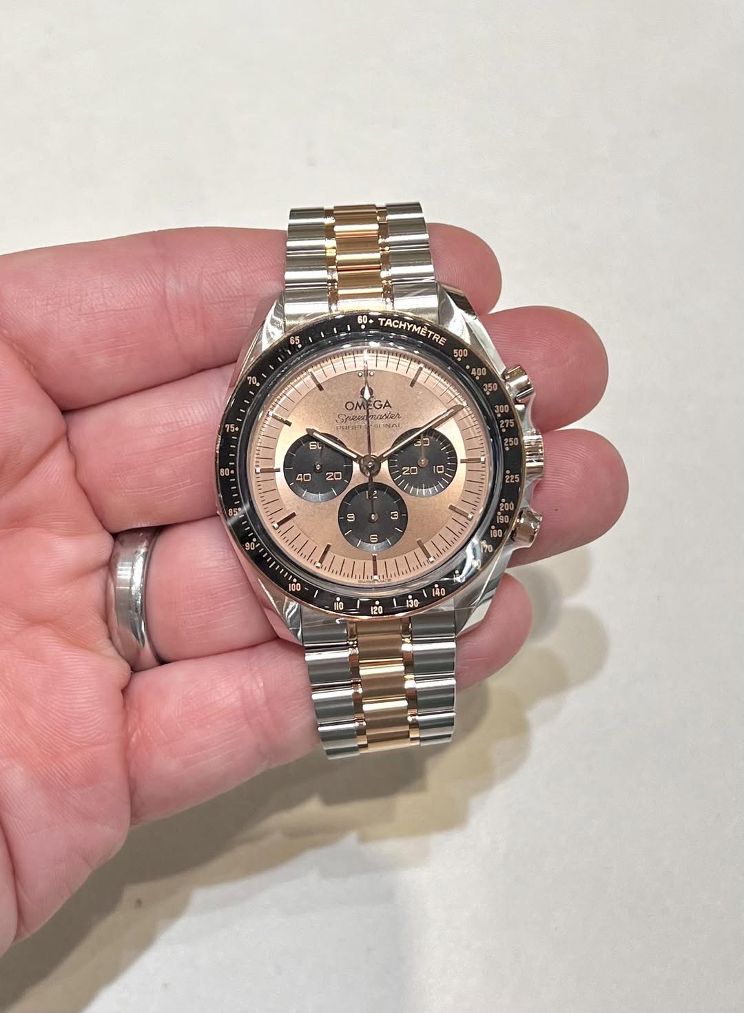 May be an image of wrist watch and text