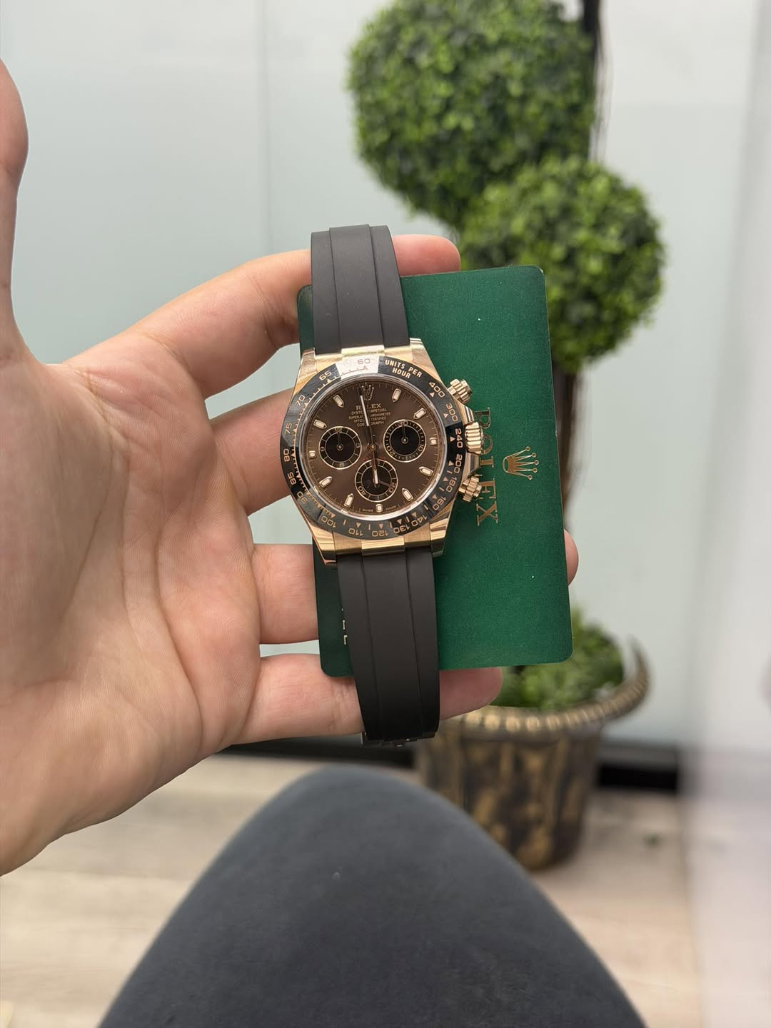 May be an image of wrist watch and text