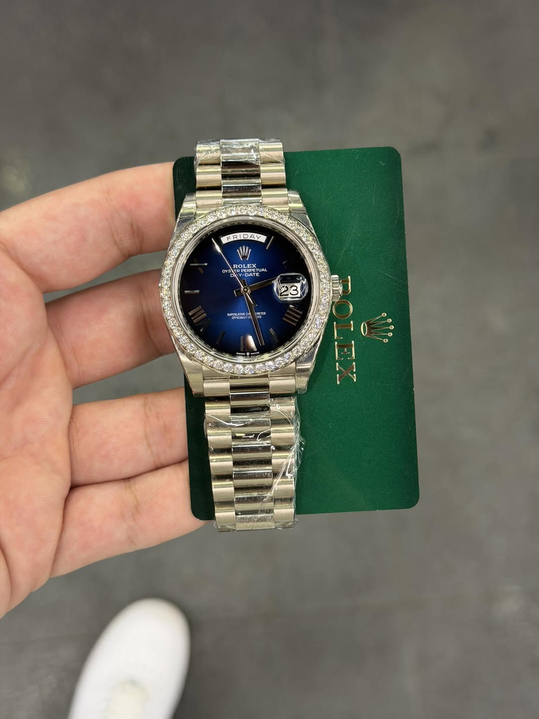 May be an image of wrist watch and text