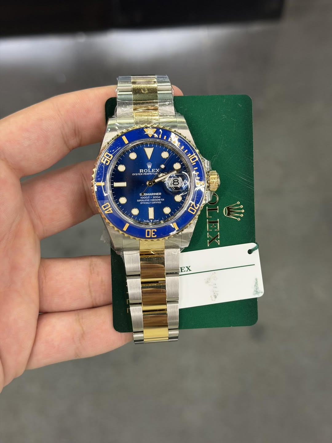 May be an image of wrist watch and text