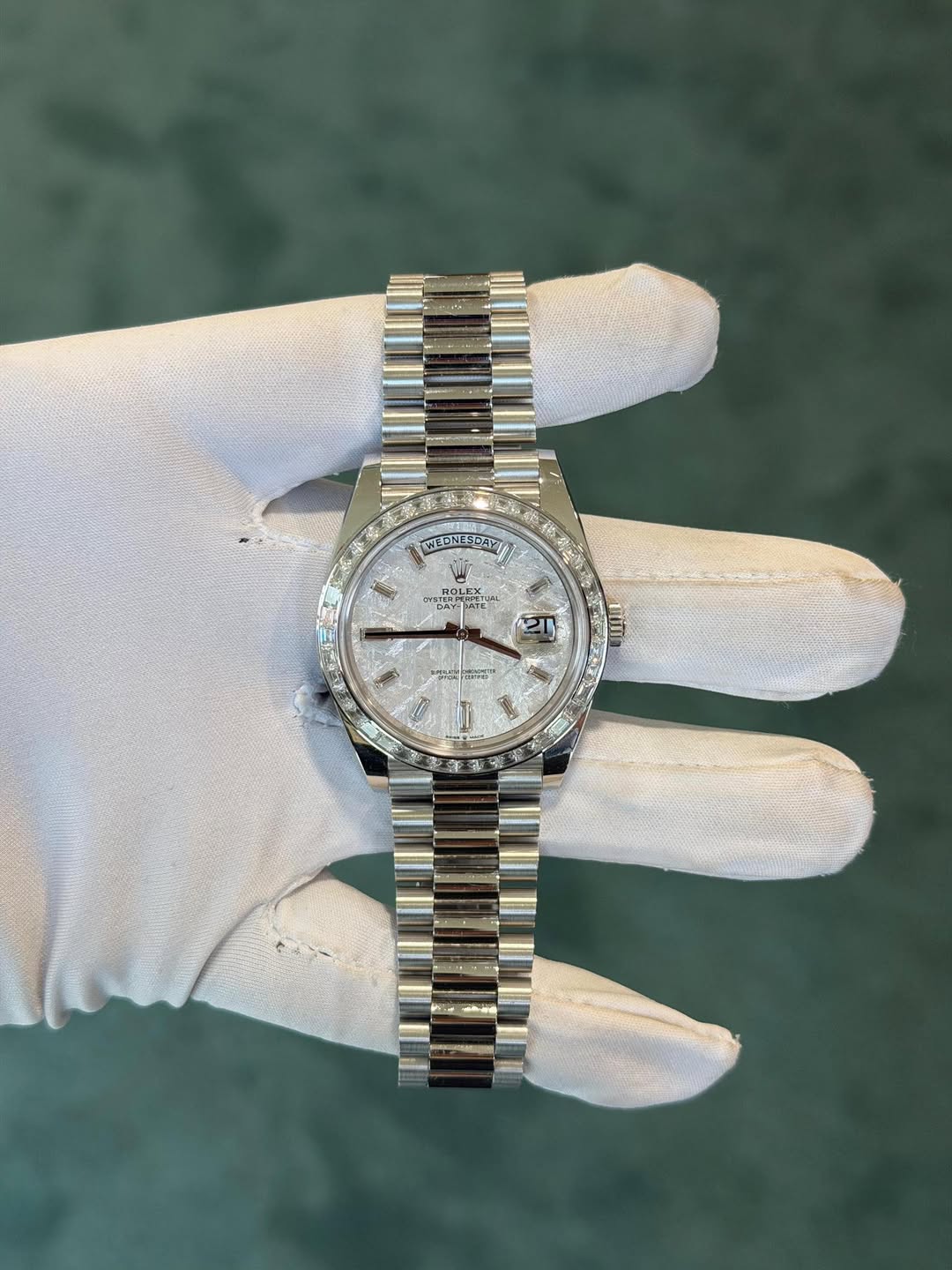 May be an image of wrist watch and text