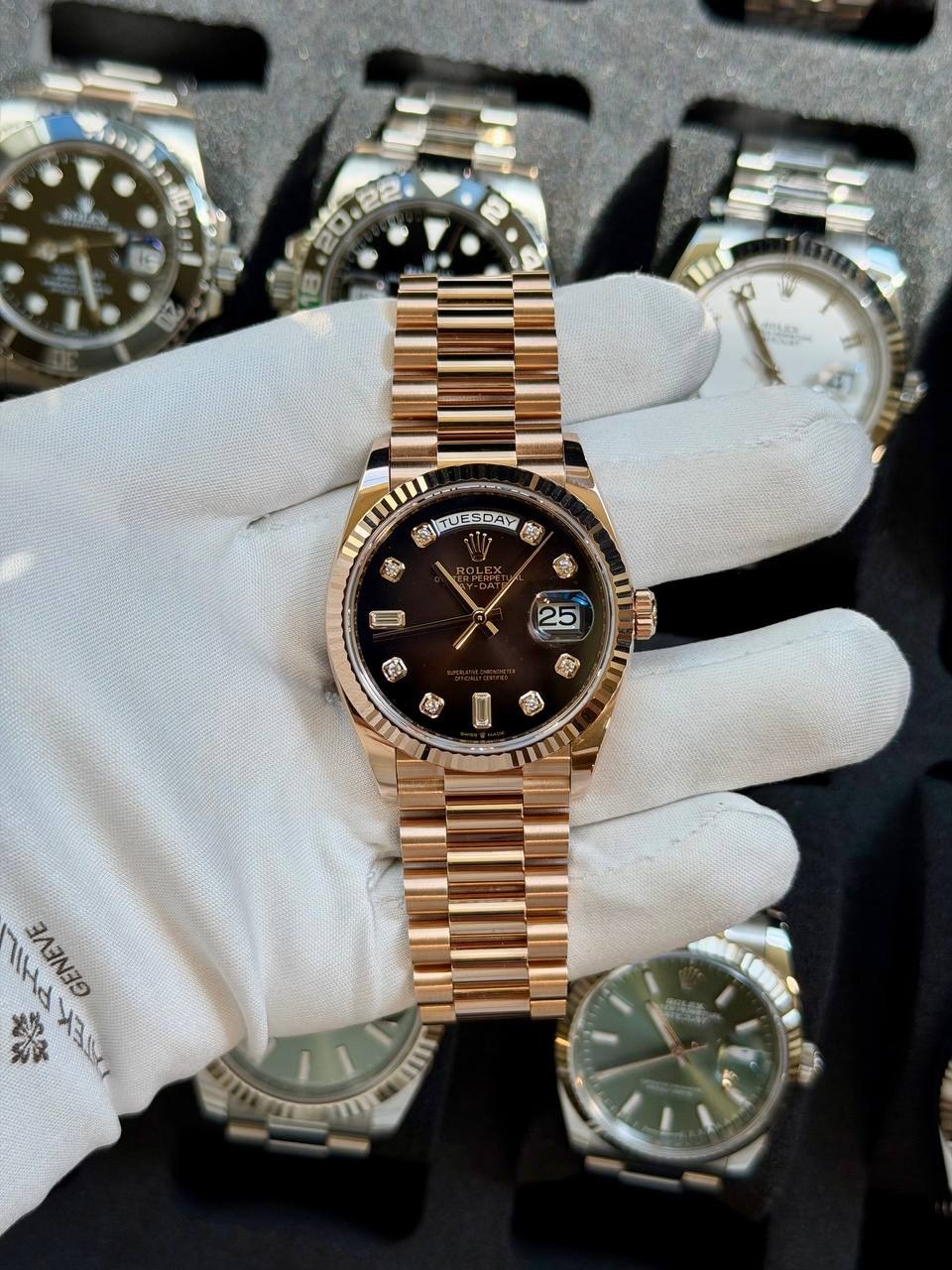 May be an image of wrist watch and text