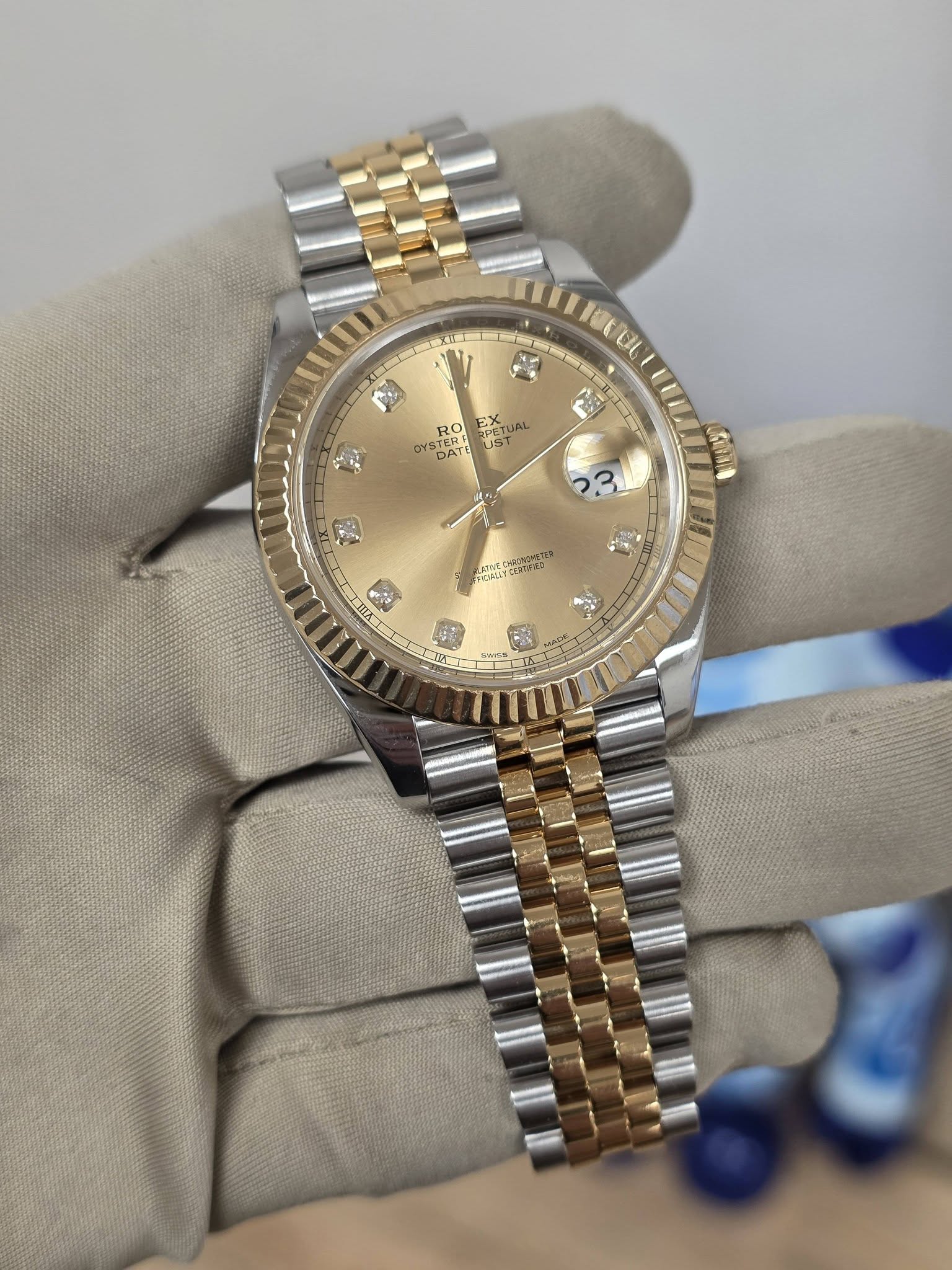 May be an image of wrist watch and text